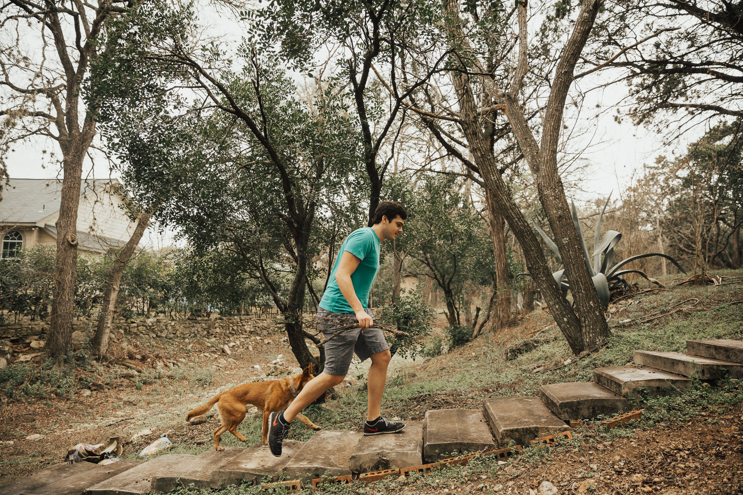 grabbing firewood from across the creekbed 