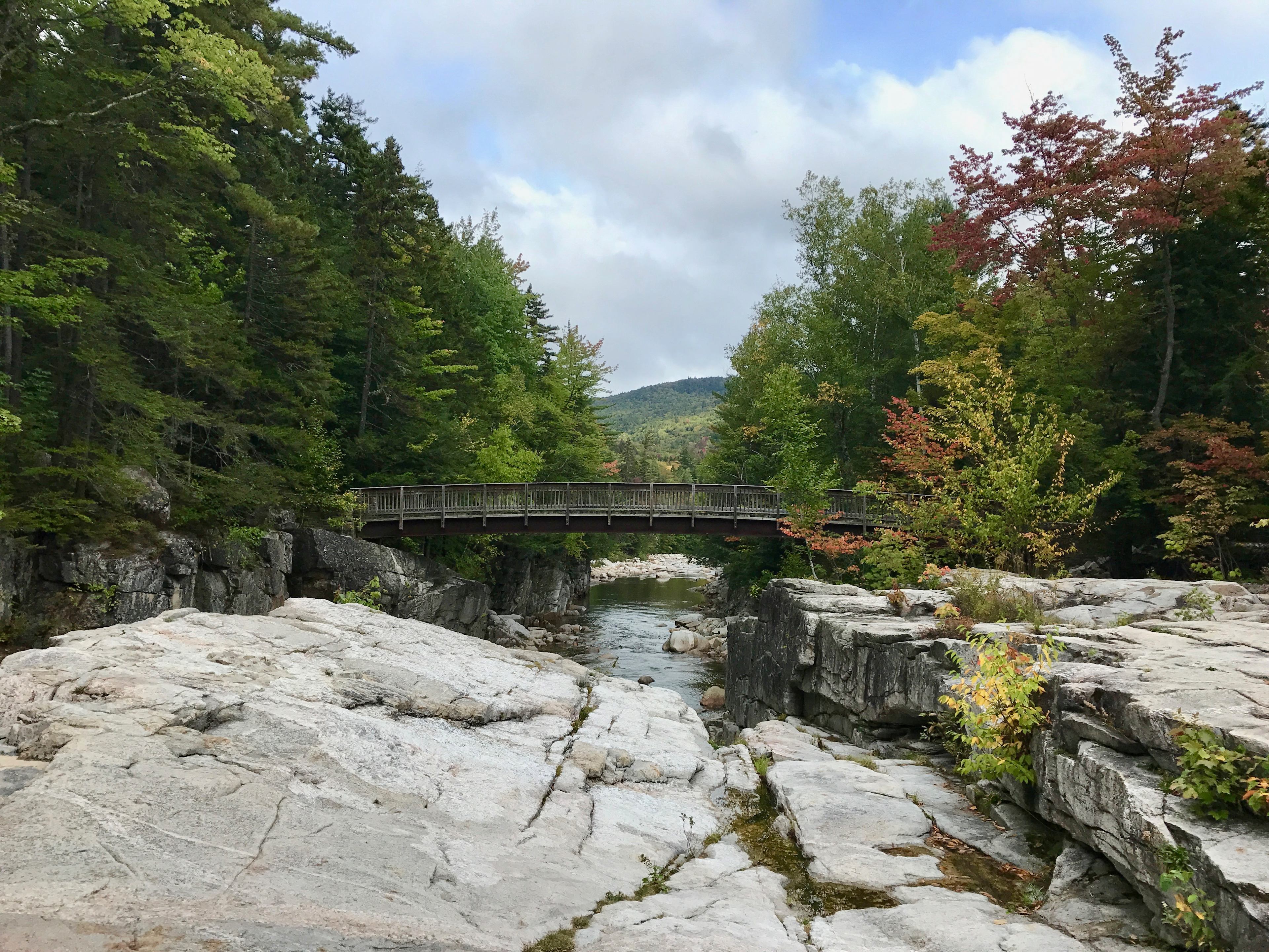Rocky Gorge located 5 miles east of Passaconaway on the Kancamagus Highway. Very scenic. Great hiking trail for old pups.