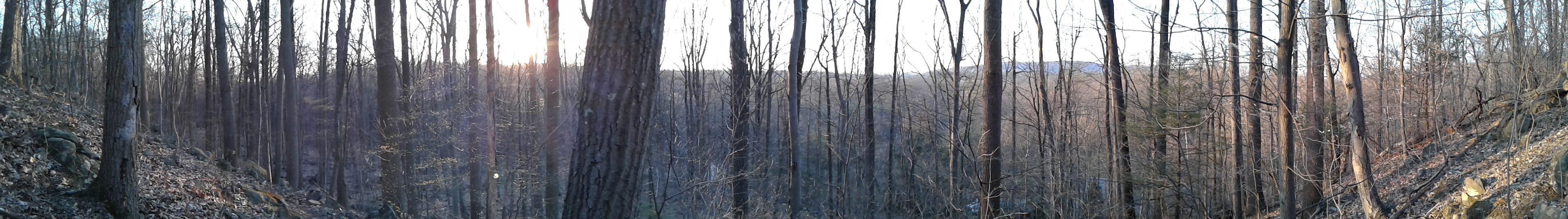 A panoramic view in November 2017 shows a 12 mile northwestern view. The shoulders of Fancy and Sand Hills are visible in the foreground while the tops of Monocacy and Gibraltar Hills are seen to the left.  Mt. Penn can be glimpsed on the furthest horizon.
