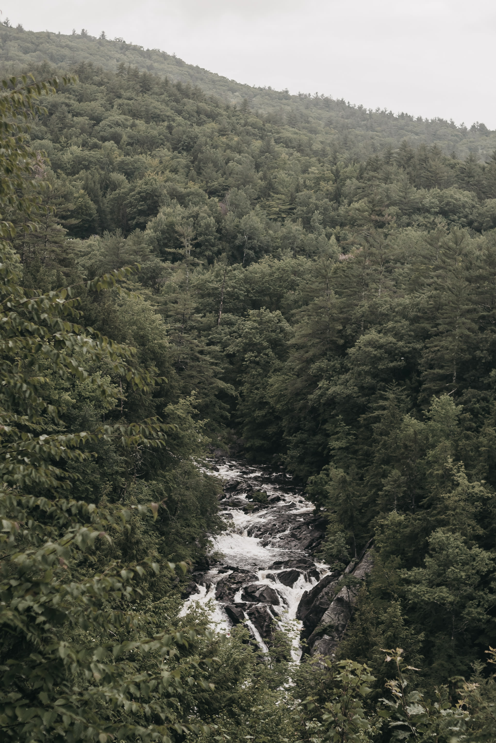 Waterfalls from the trail near the camper. There are a couple of chairs here where you could sit and listen to the falls all day.