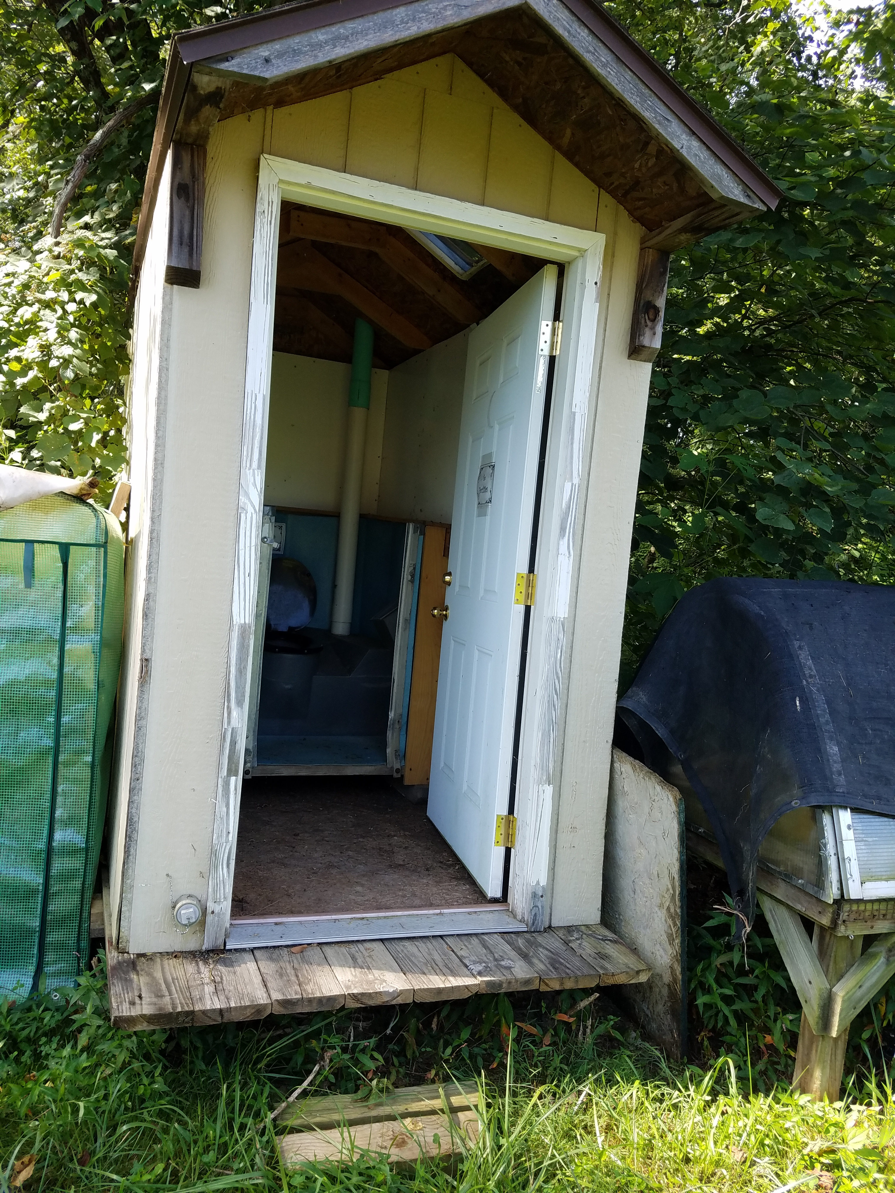"The Facilities" - a composting porta-potty.
