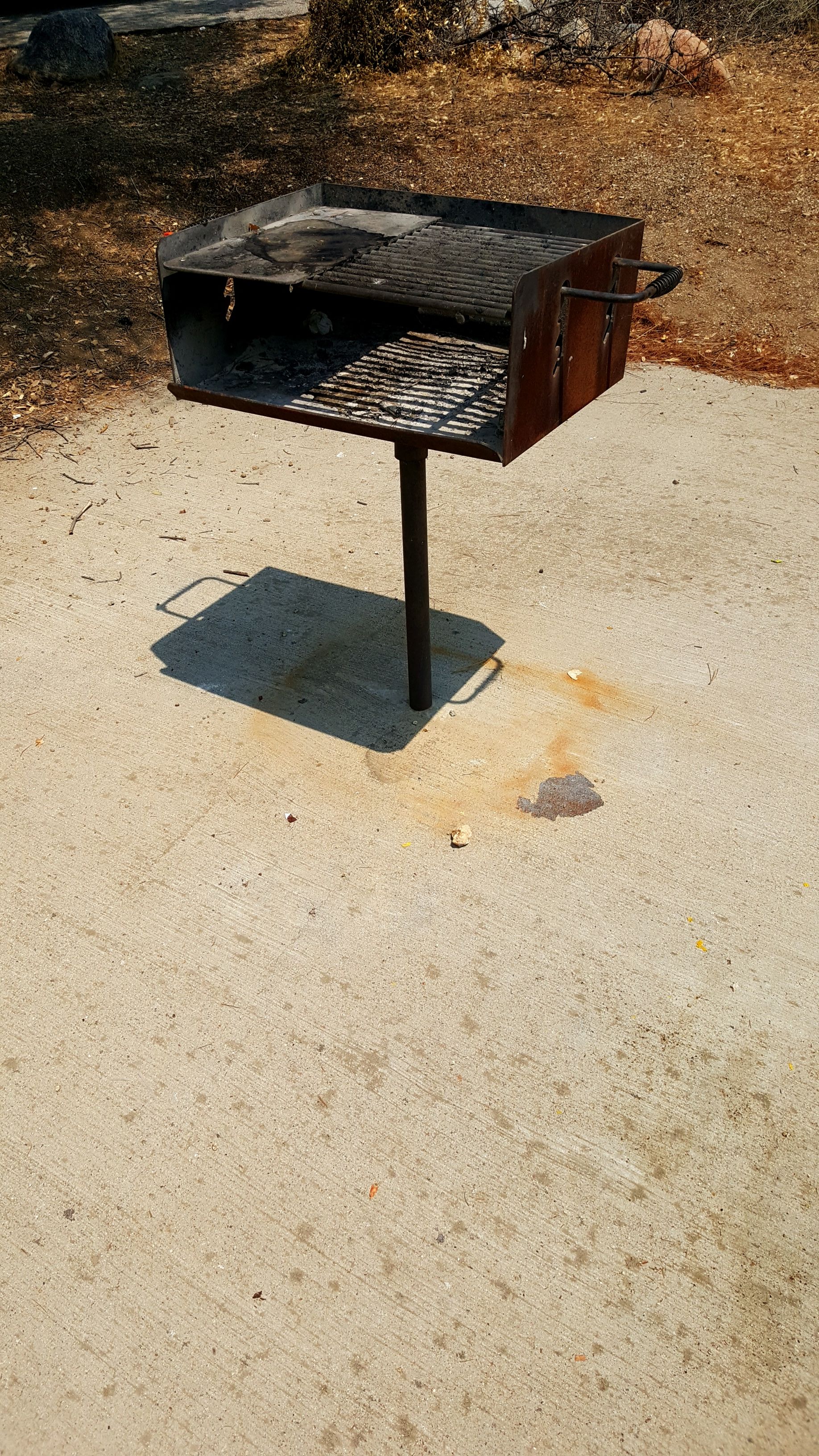 Charcoal grill on each campground