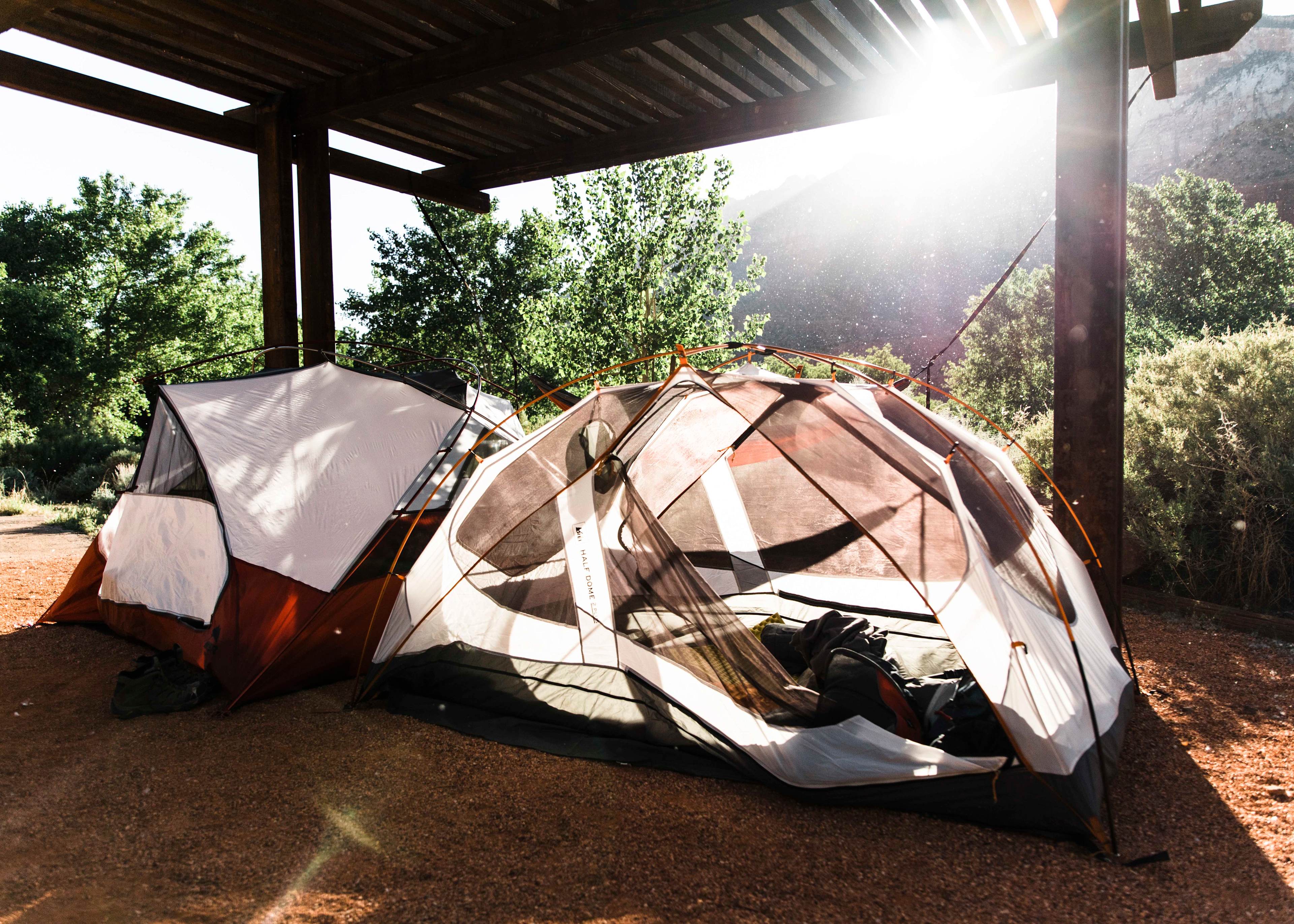 The Fremont Cottonwood trees of Zion NP release their flowers in the Spring, causing what look like cotton balls to float through the air. If you look closely behind the tents, you can see the effect this created near dusk.