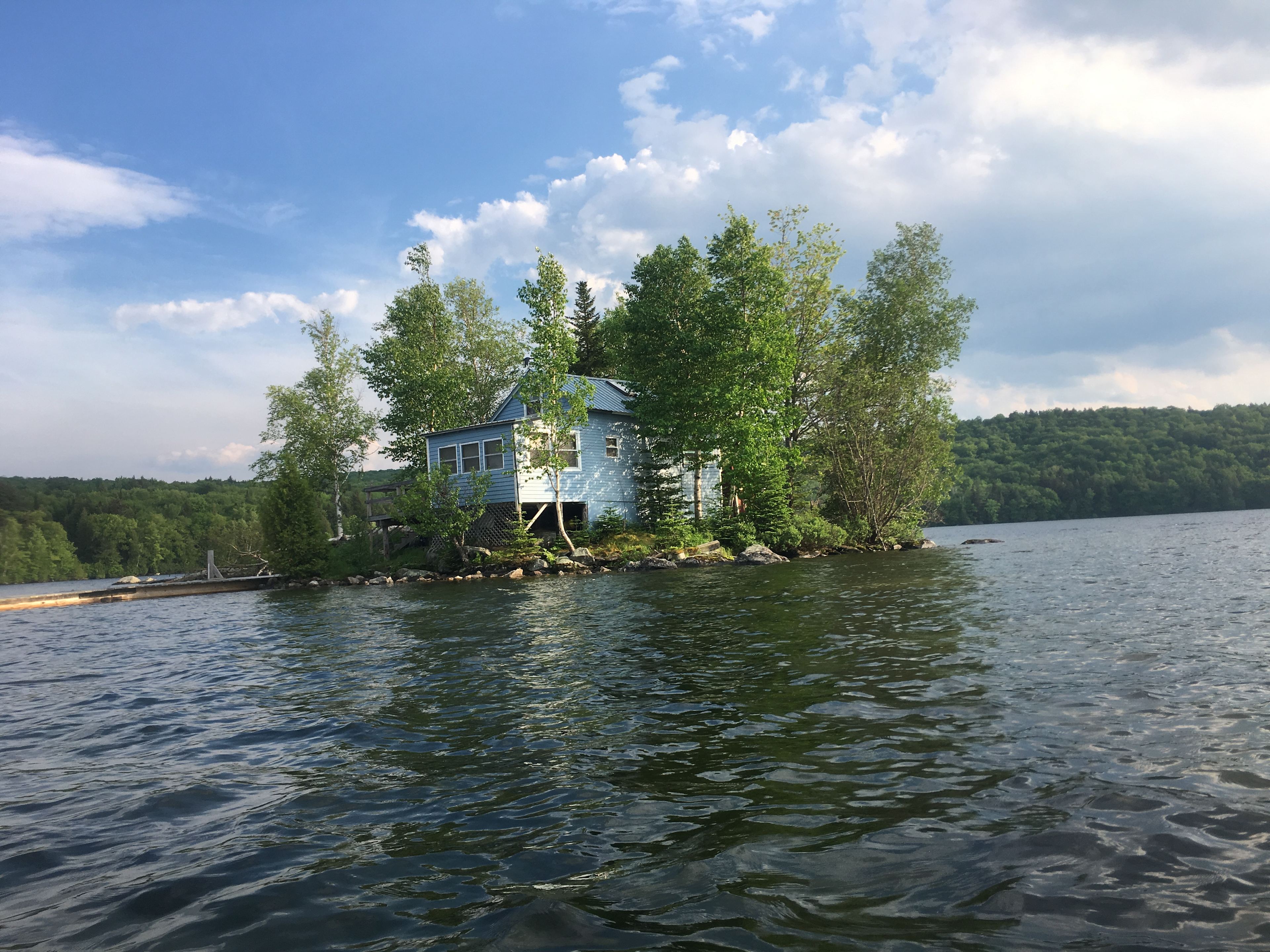 There is a house in the middle of the lake