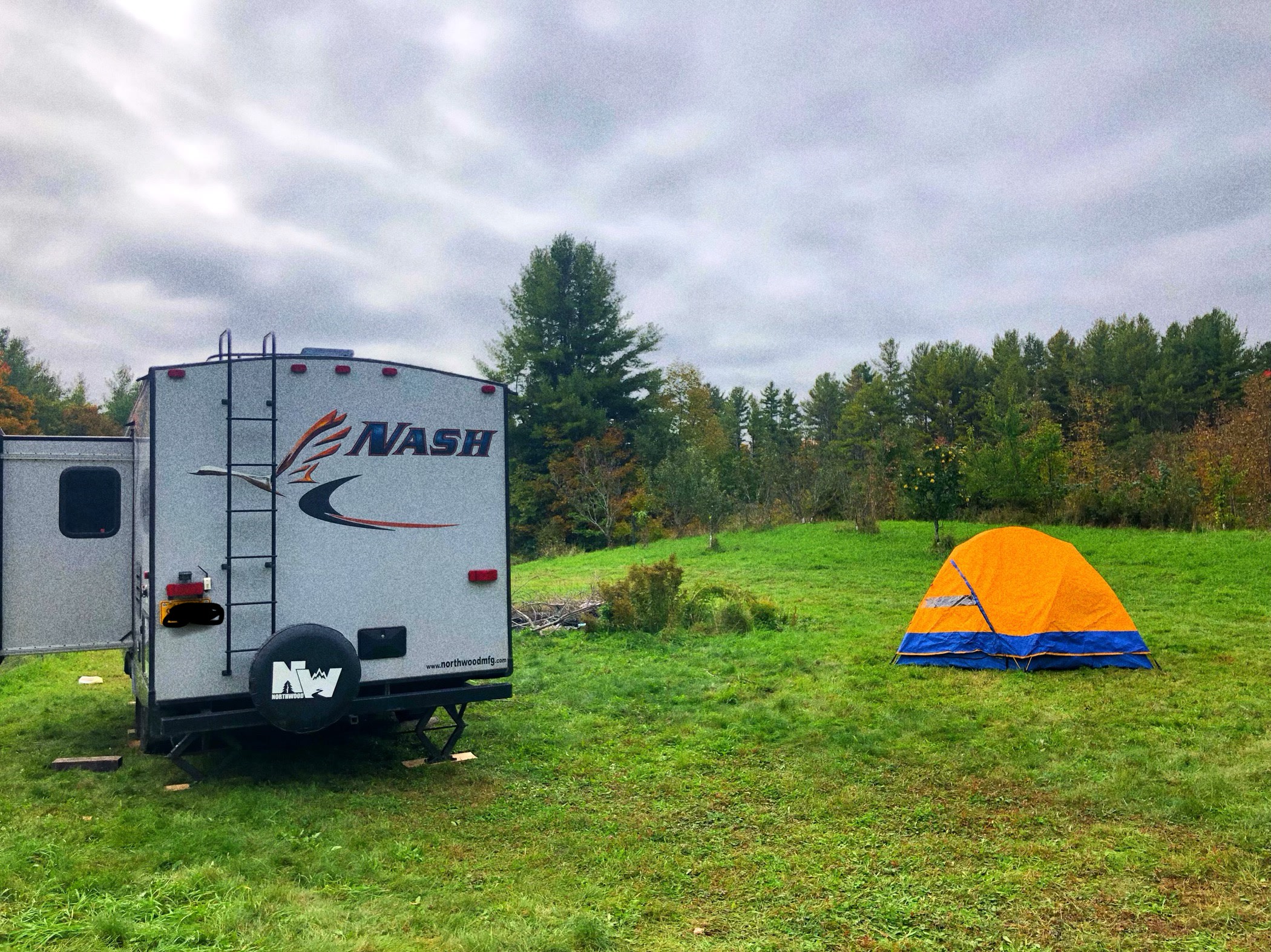 We have a couple flat grassy areas that are just right for parking & leveling your camper/trailer. 