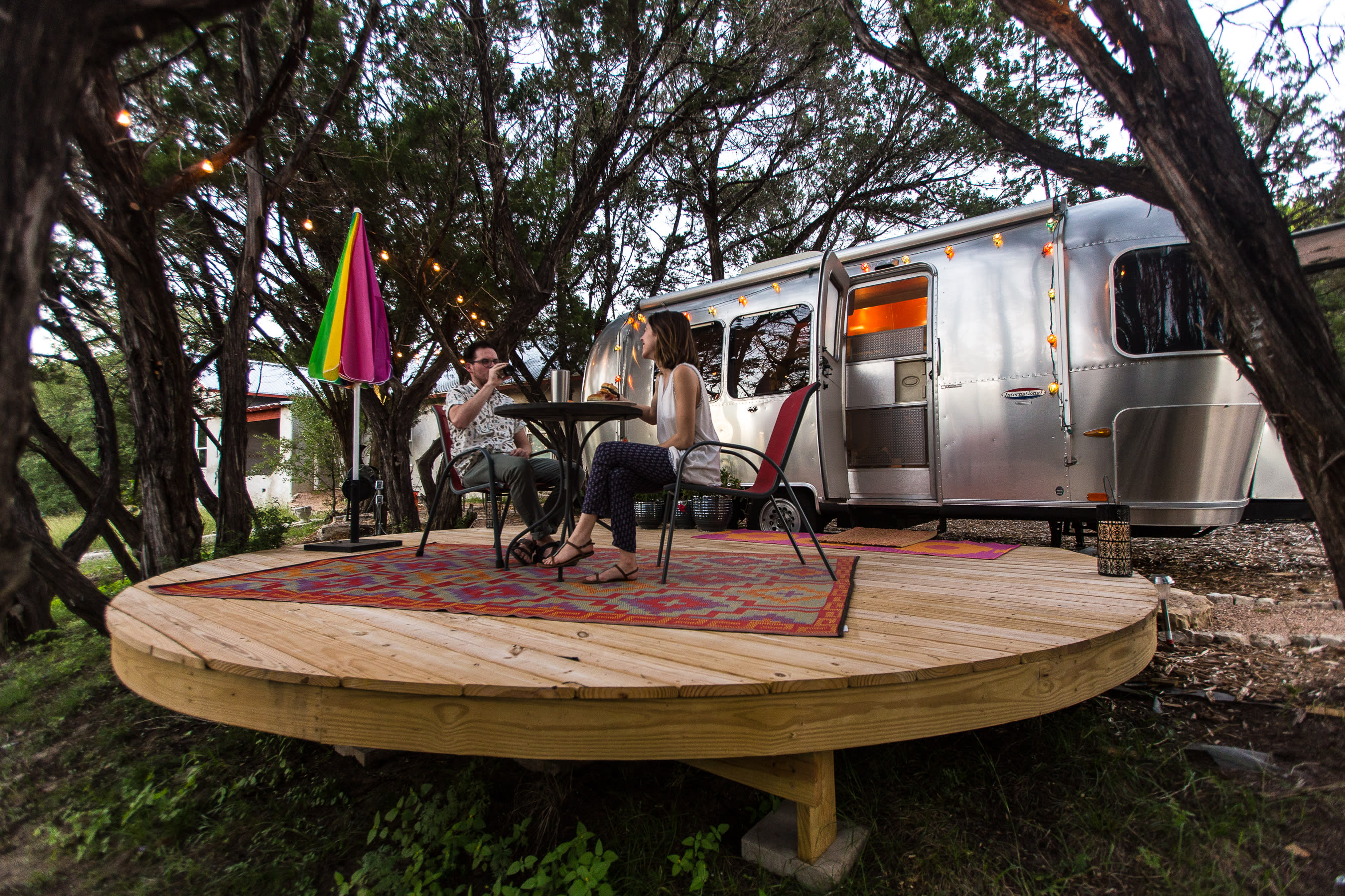 Enjoying dinner on the private platform deck outside the airstream.
