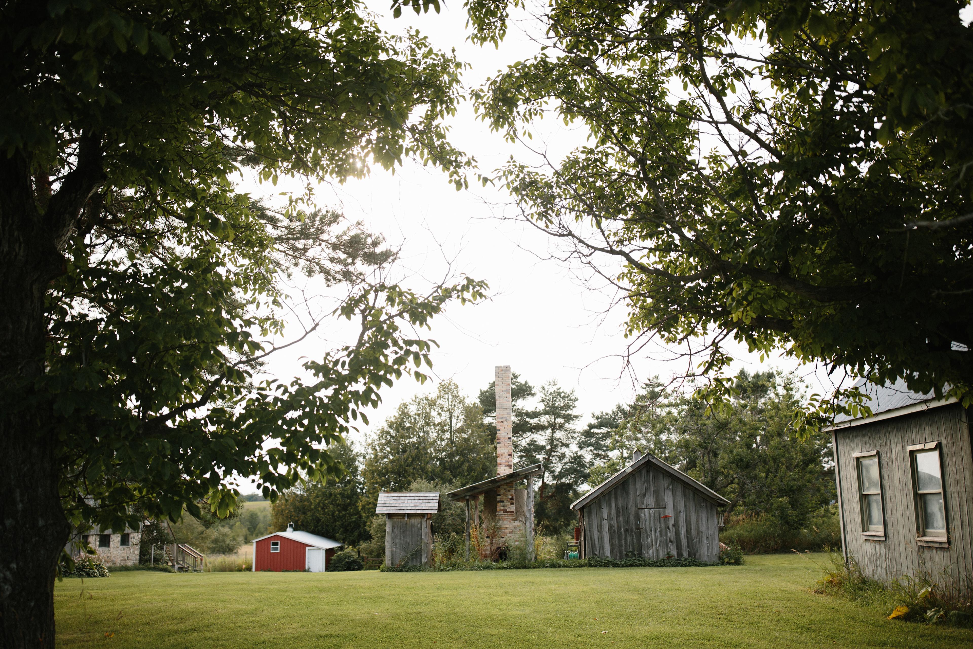 Farm yard camping close to the bathrooms and shower located in the barn.