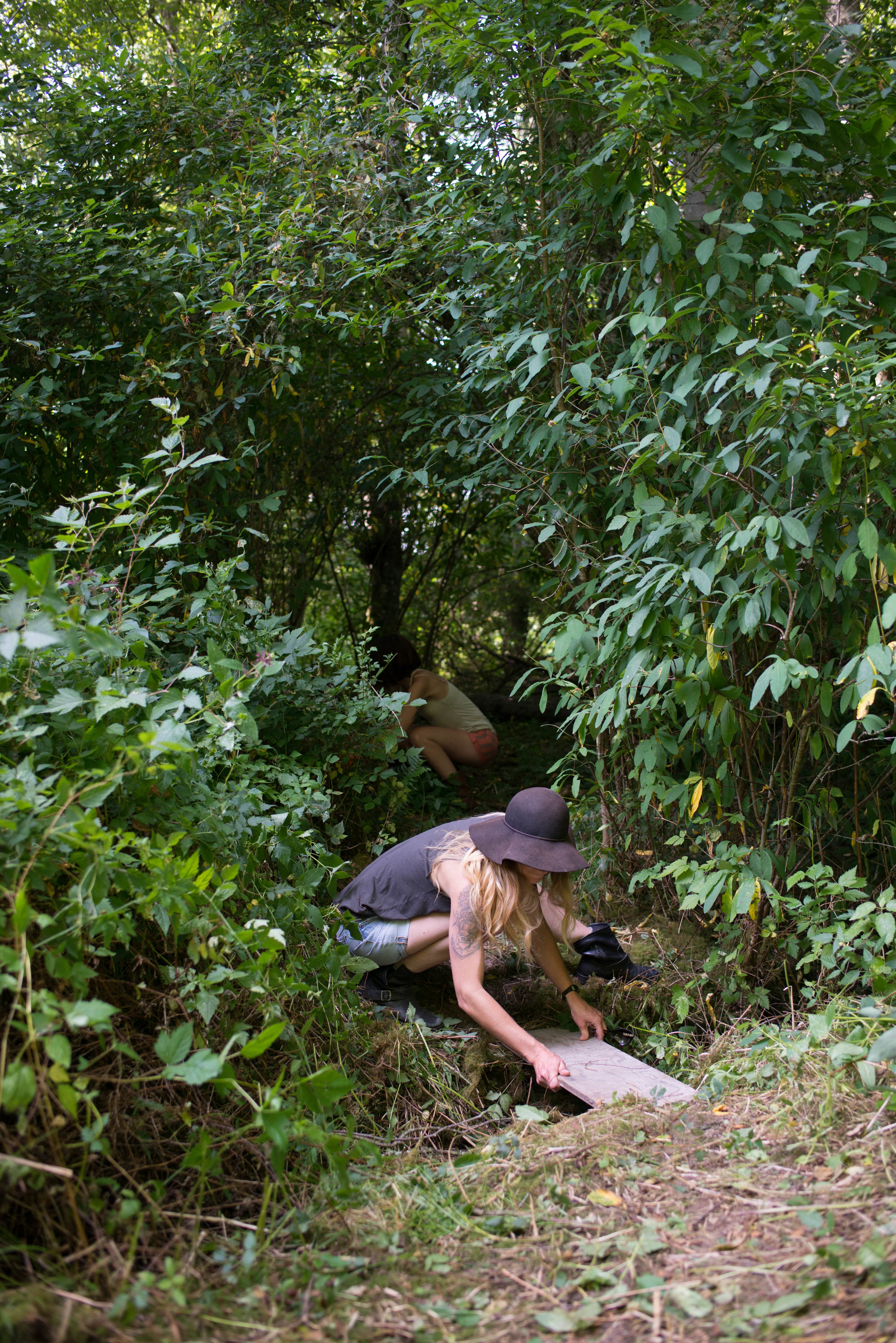 The girls hard at work building an awesome hangout in the shade