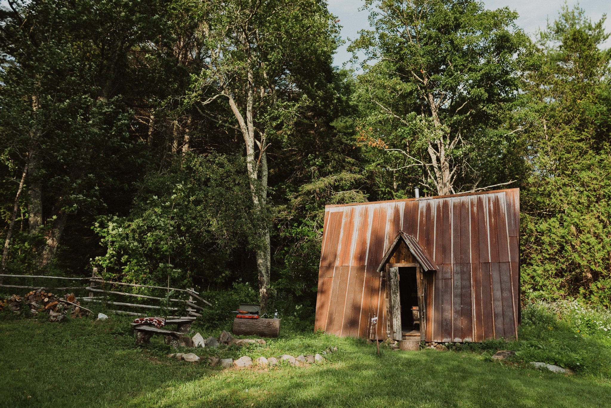 Entrance to the SiloSide A-Frame with fire pit and benches