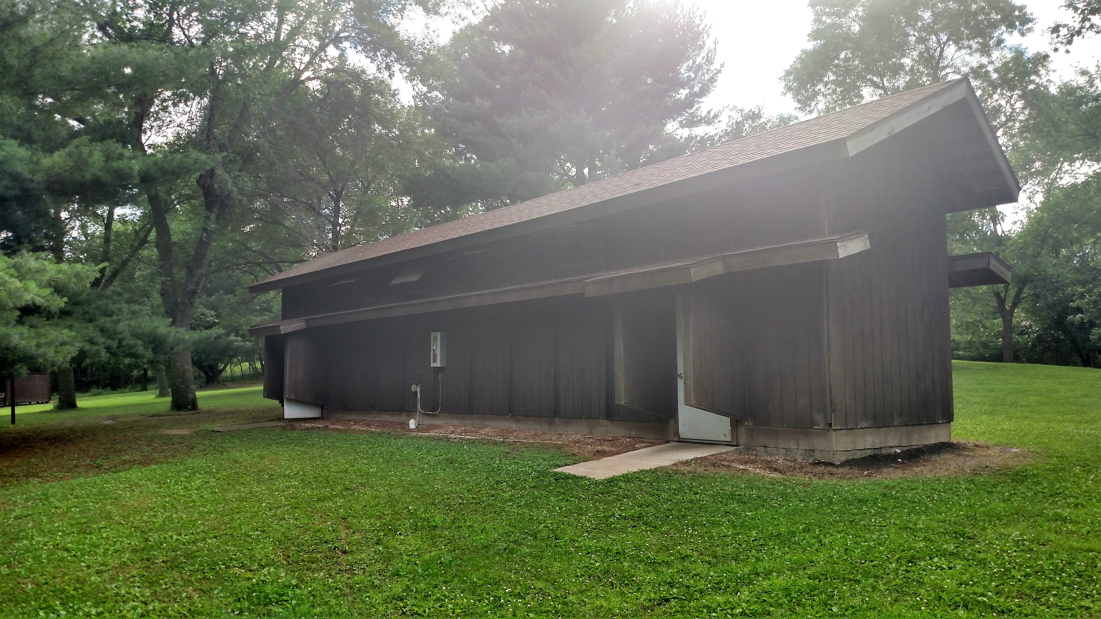 This is one of 2 shower houses provided, Men and Women have designated sides each with a toilet, sink, and 4 private showers and a bench for clothing. 