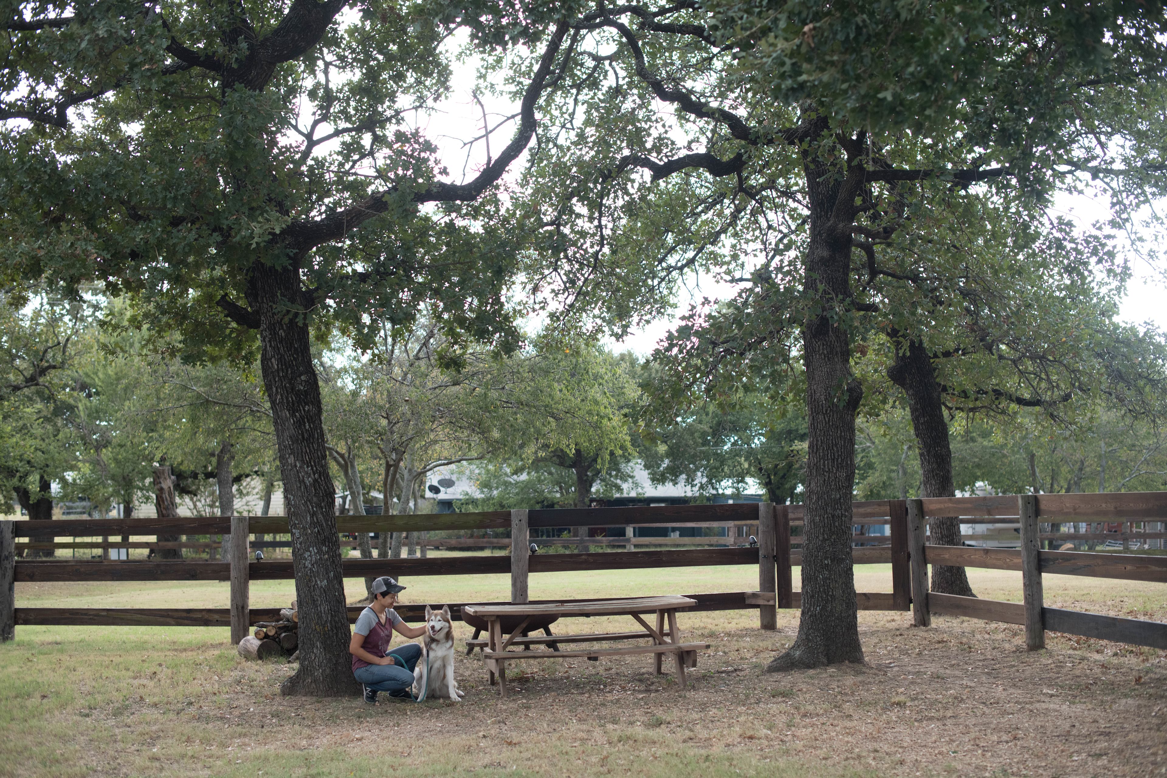 There is a picnic table and fire pit for communal use