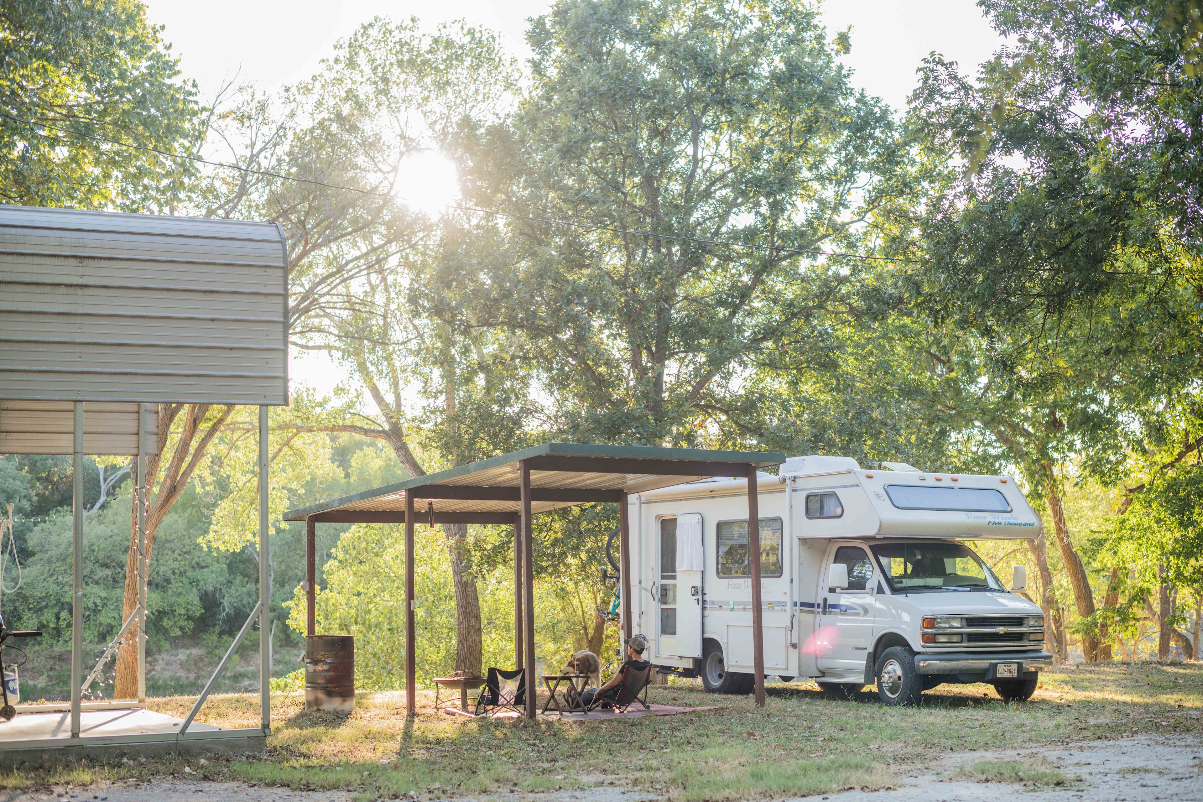 The RV site is level land it was so nice to have a covered picnic pavilion to set up in