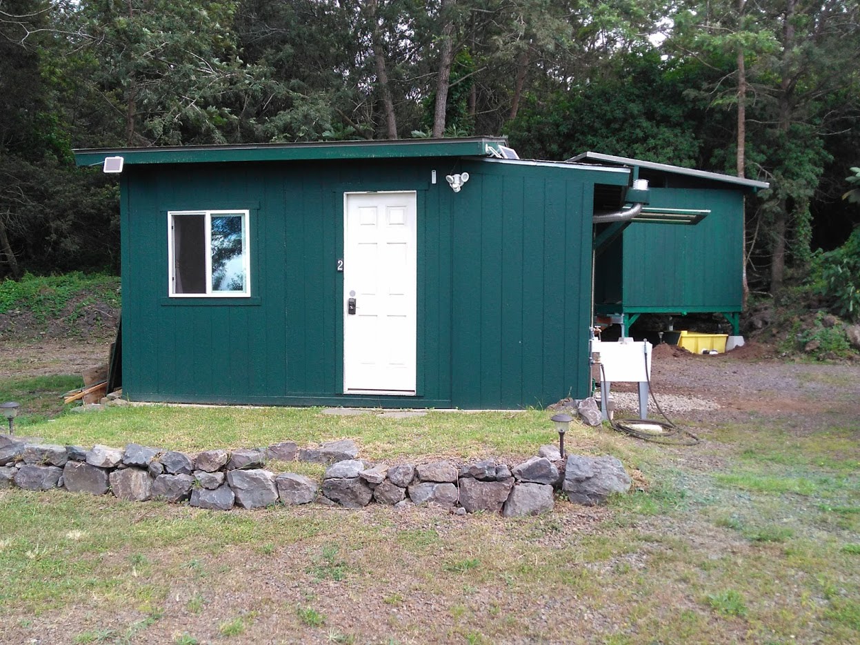 Cabin 2 with wash basin. Comfort Station in the rear