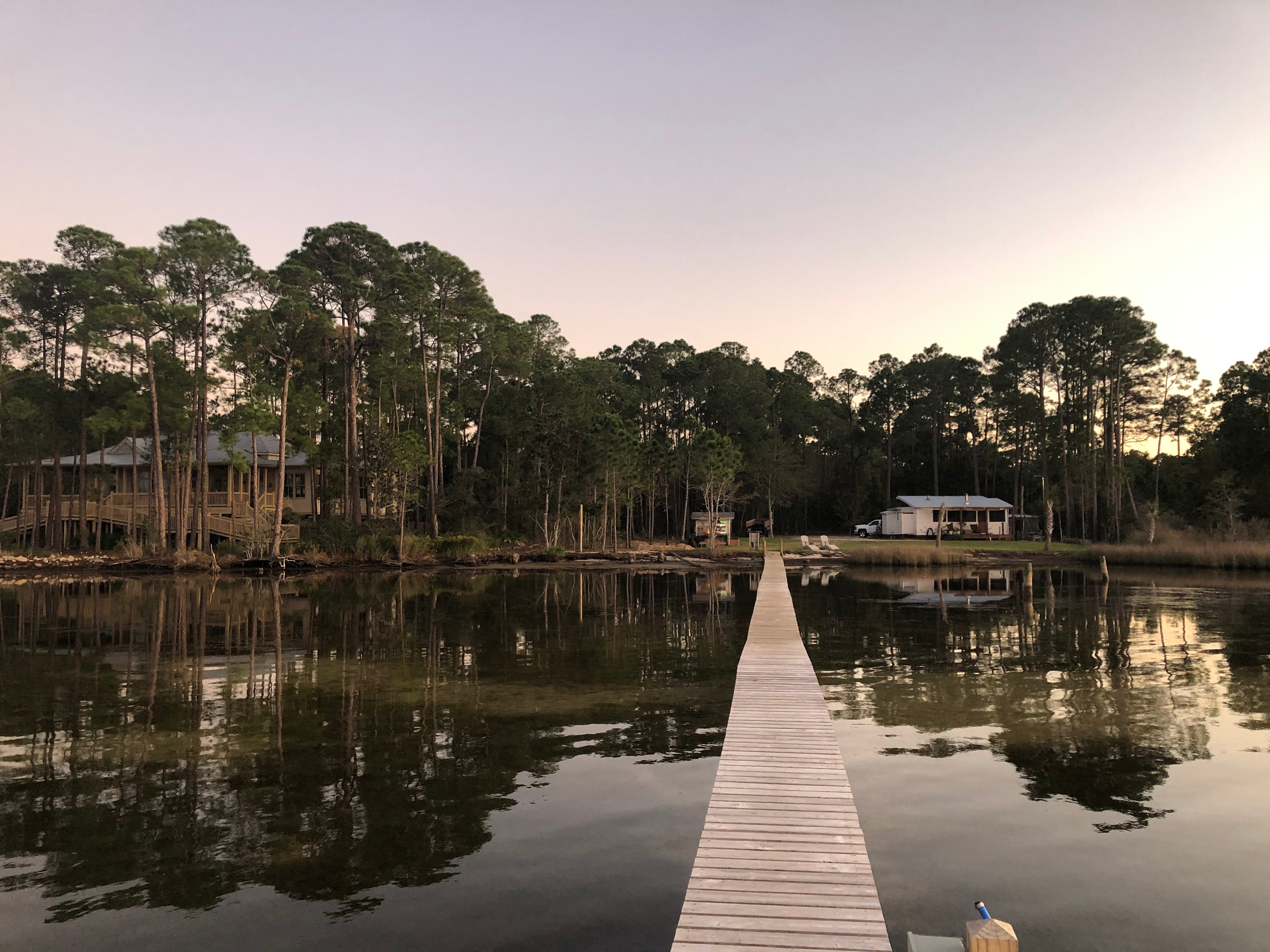 The view of the property and only adjoining neighbor from the sunset viewing dock. 