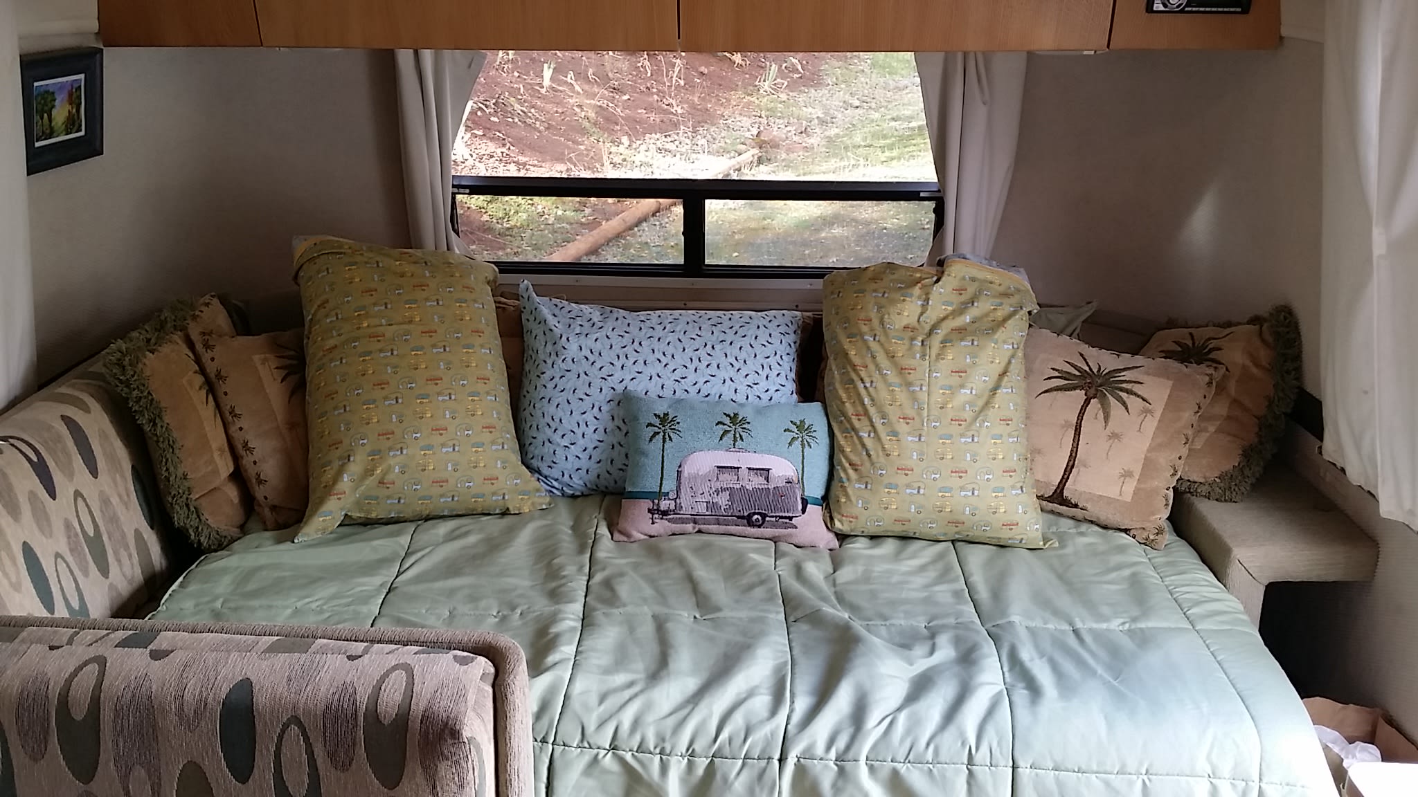 Airstream's couch and dining table convert to beds for 1 adult each or multiple children. 