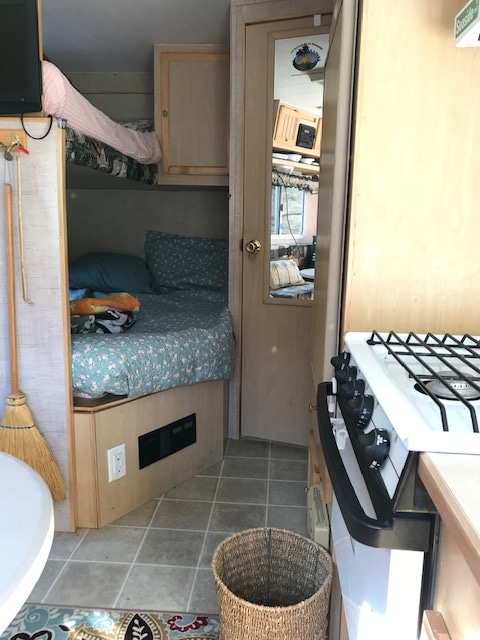 two beds, door to bathroom