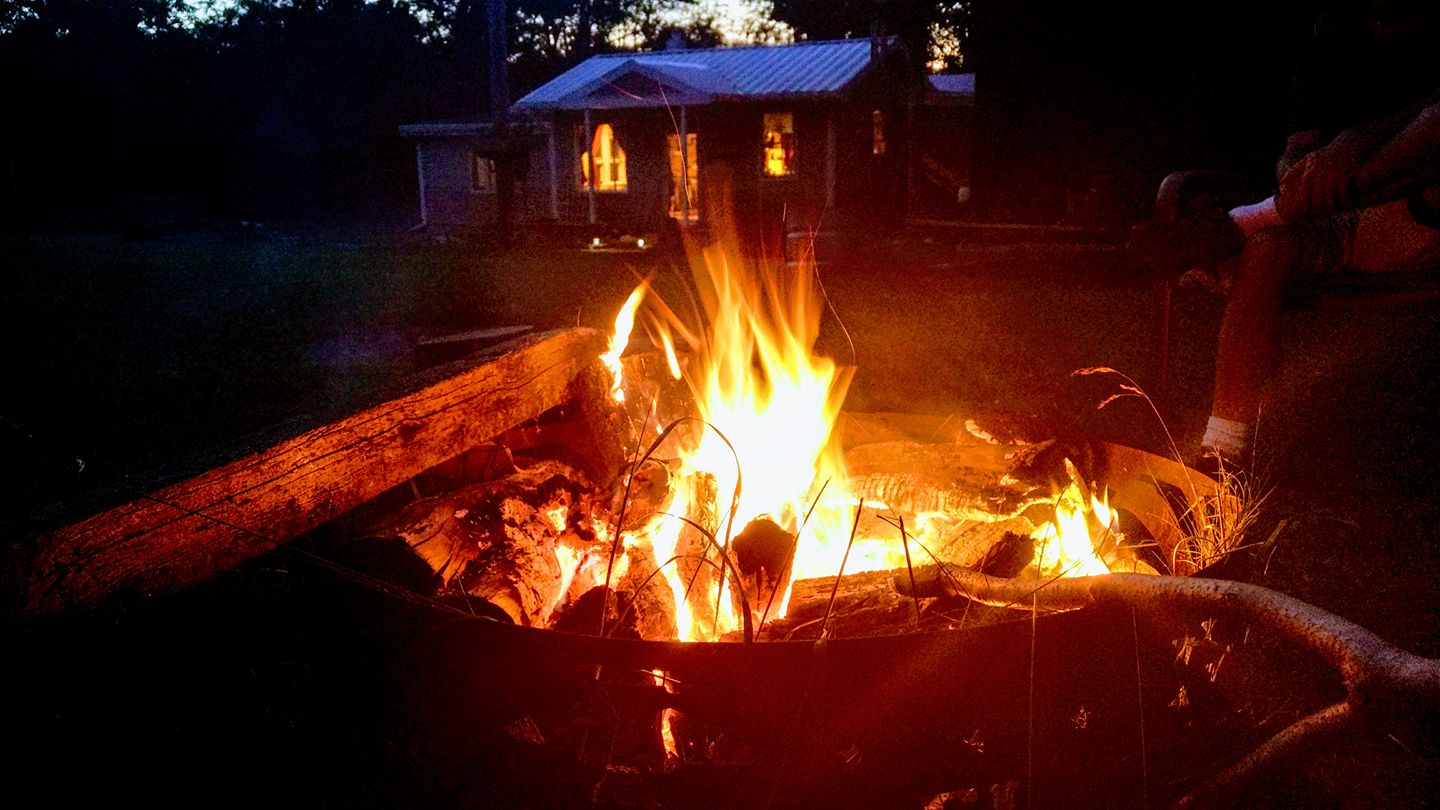 Fire ring near the tiny house and looking toward our main house.