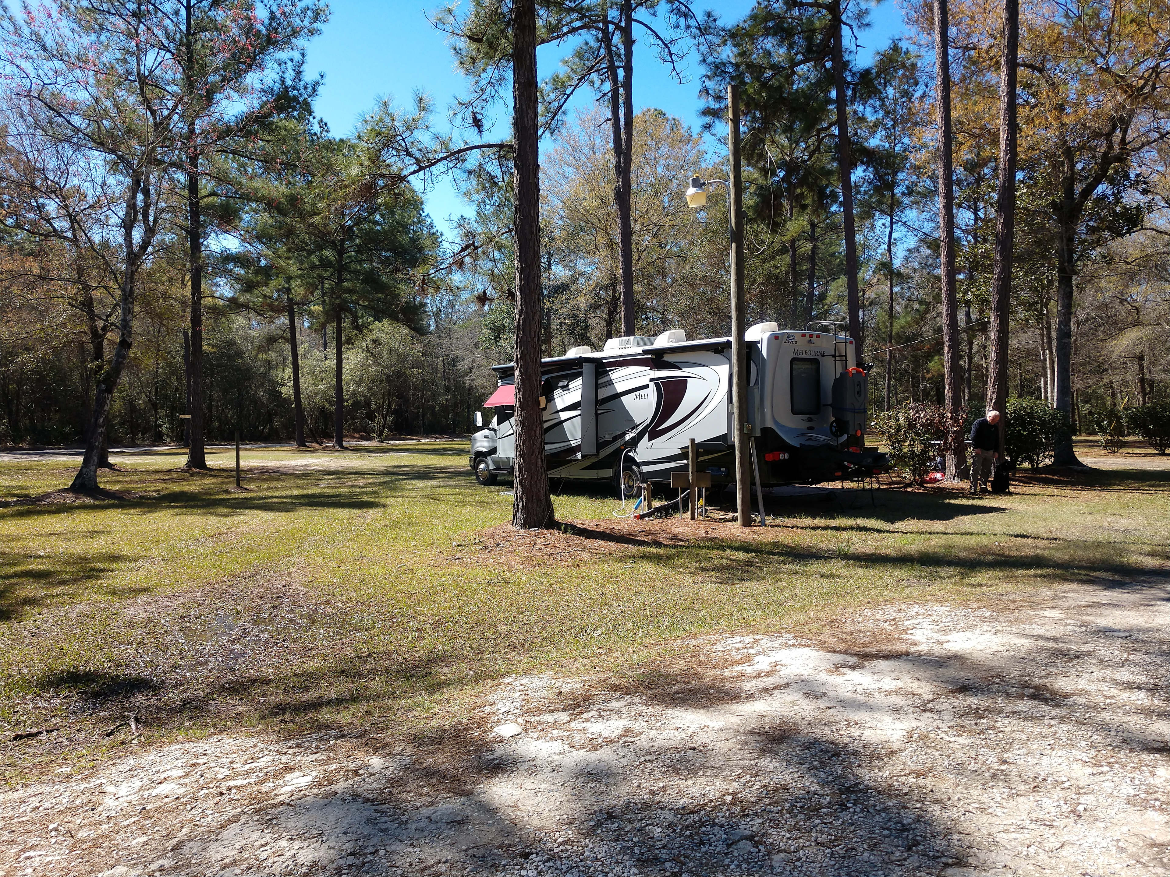 Site 13. Inland side, 30, 50 amp, water and sewer, campfire ring and picnic table. Site is about a one minute to the river bank.