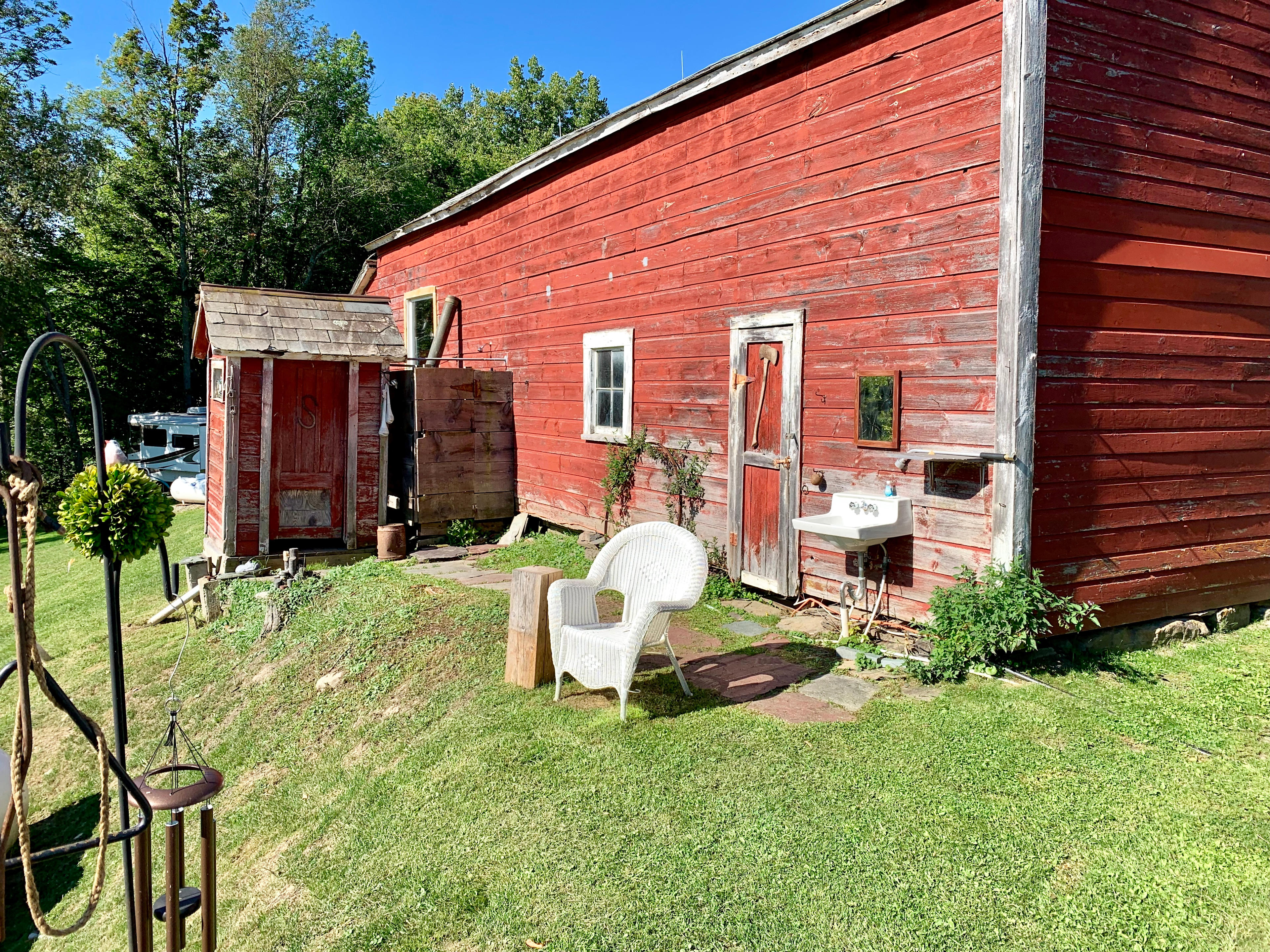 Outhouse with Flushing Toilet & Hot Water Shower & Sink
