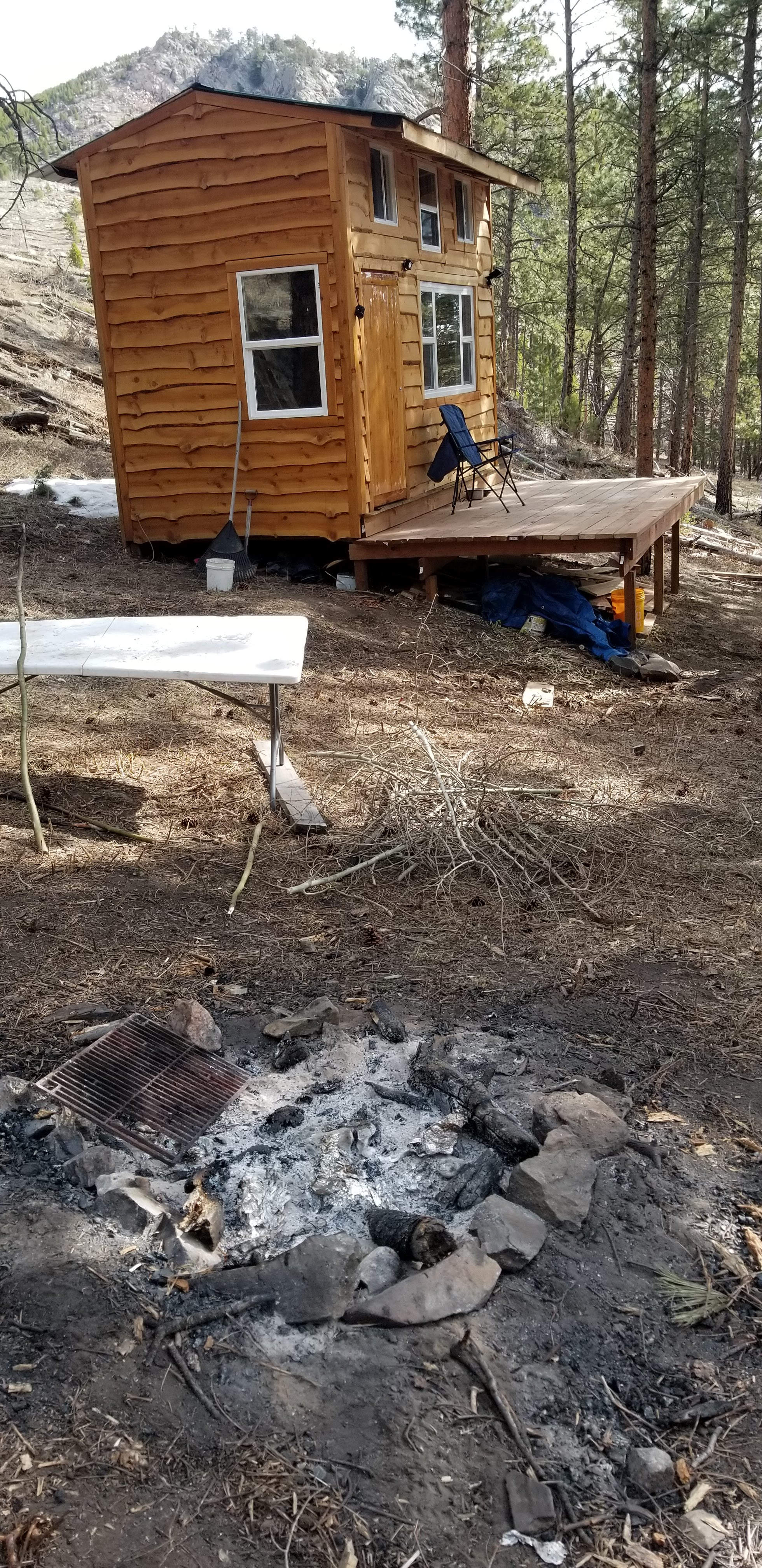 The cabin as you are coming in the driveway