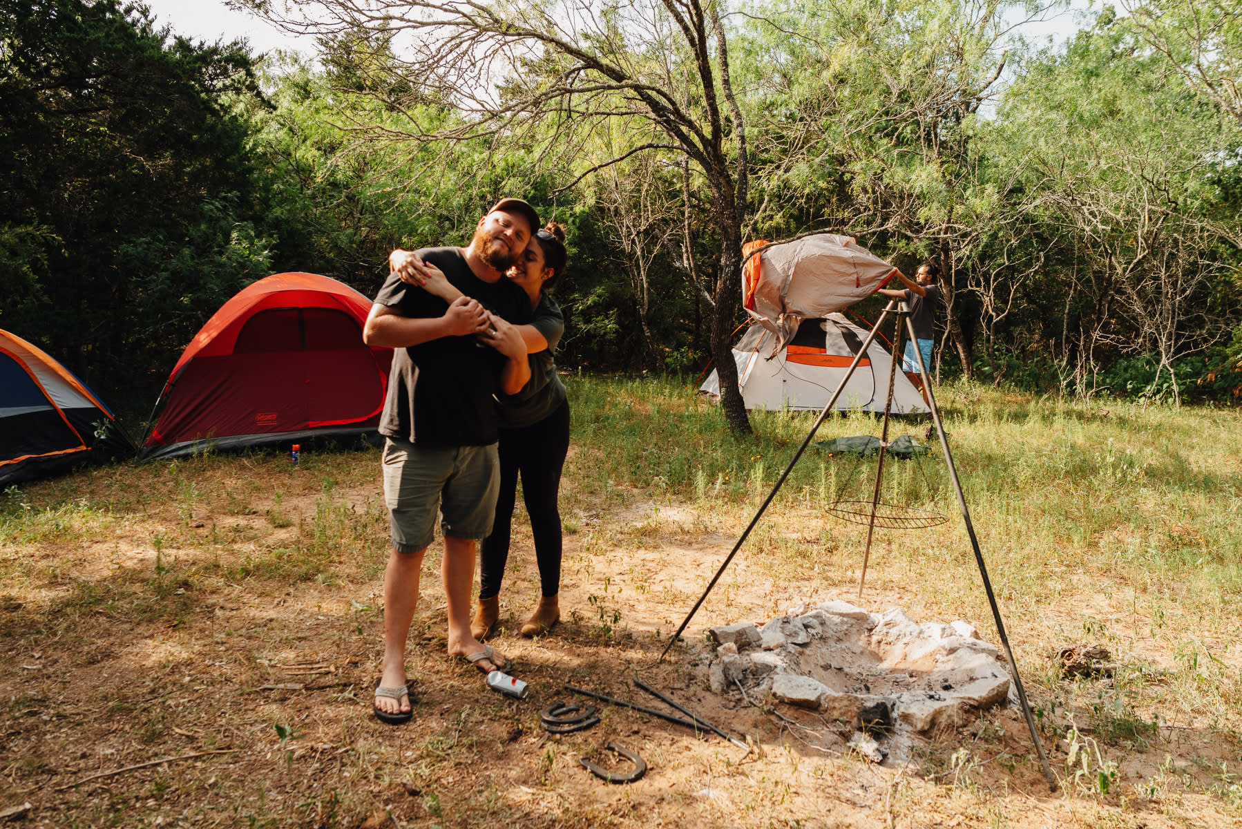 Setting up my tent with a  camera timer. Half photo bomb, but also shows you how large and flat the sites are.