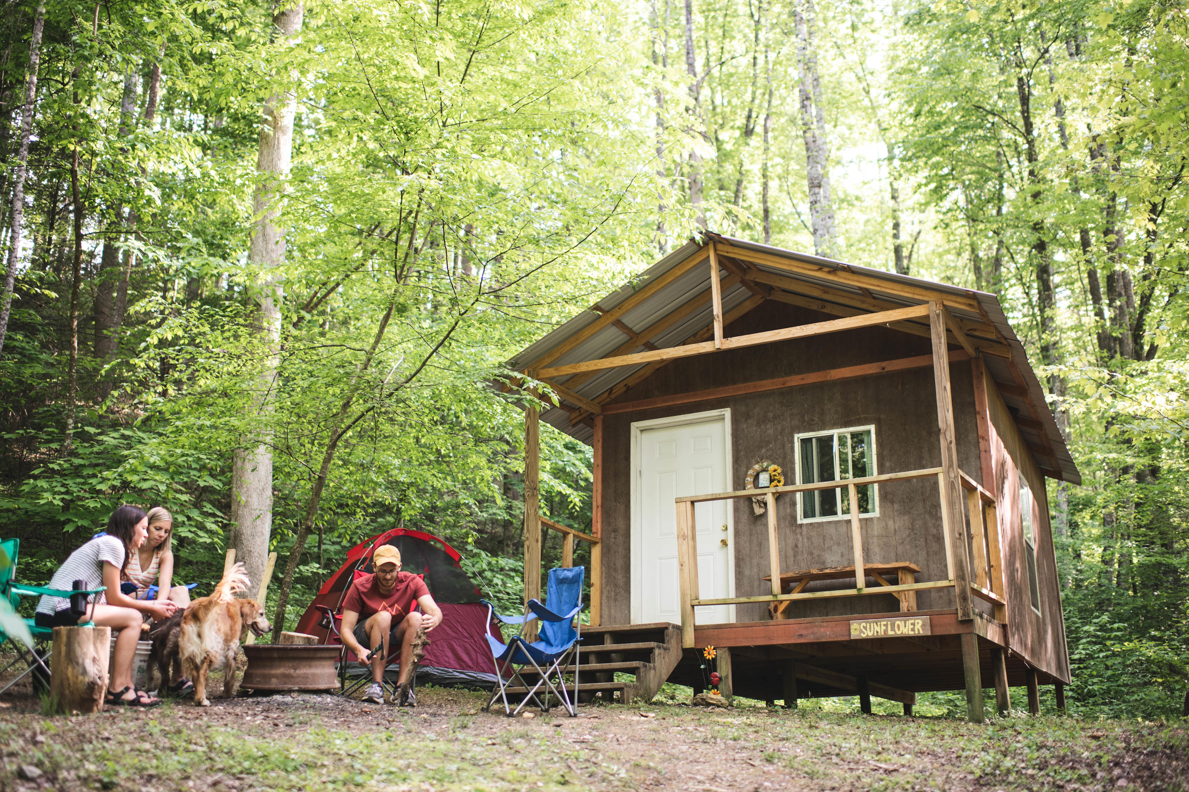 Sunflower cabin is one of 3 precious primitive cabins on the Shoestring Creek Campground property. Each cabin is tucked away in its own little private area off of the road and equipped with a fire pit, charcoal grill, and picnic table.