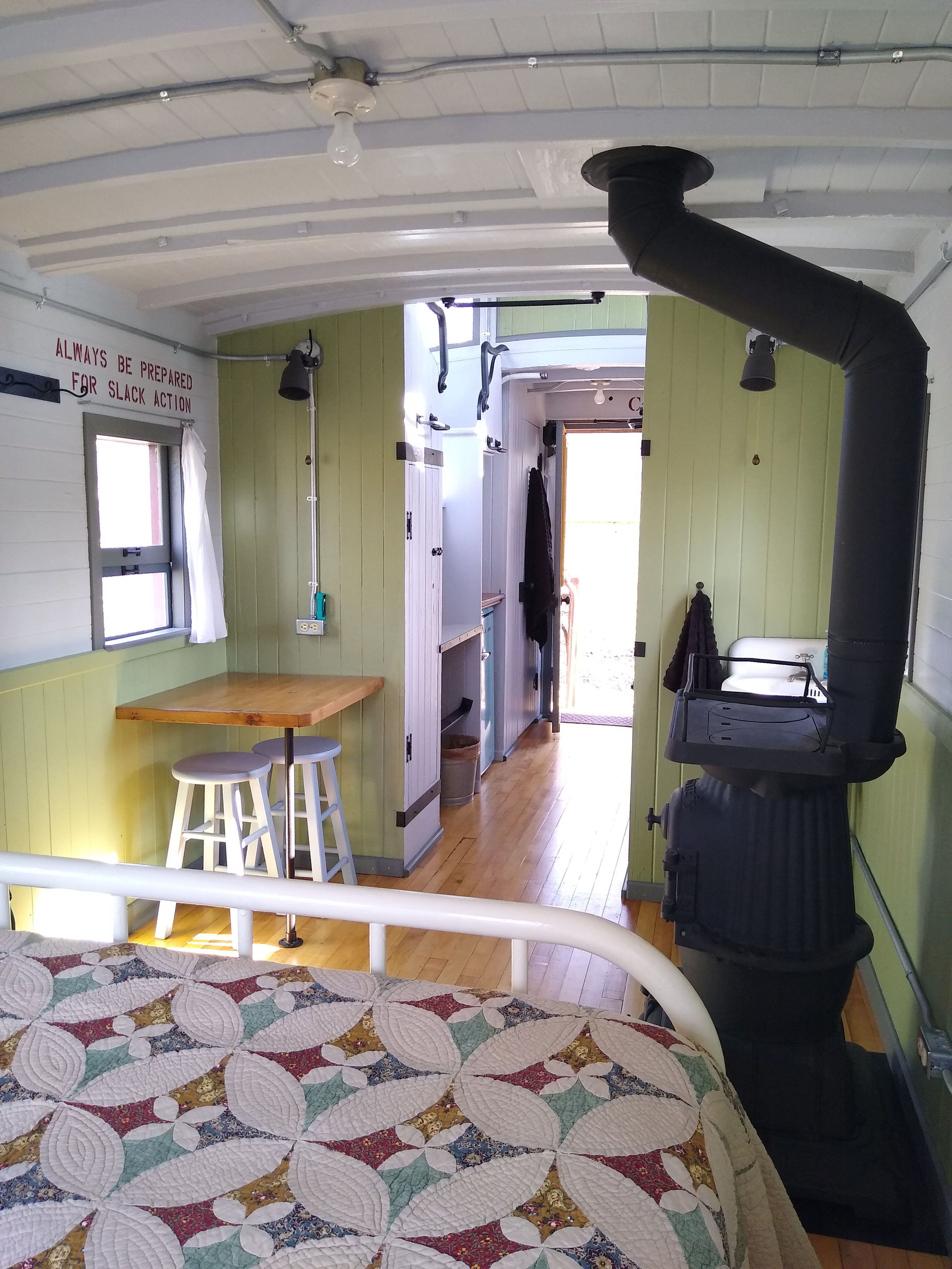 From the bed toward the door.  The shower is at the end of the hall on the right, just inside the doorway