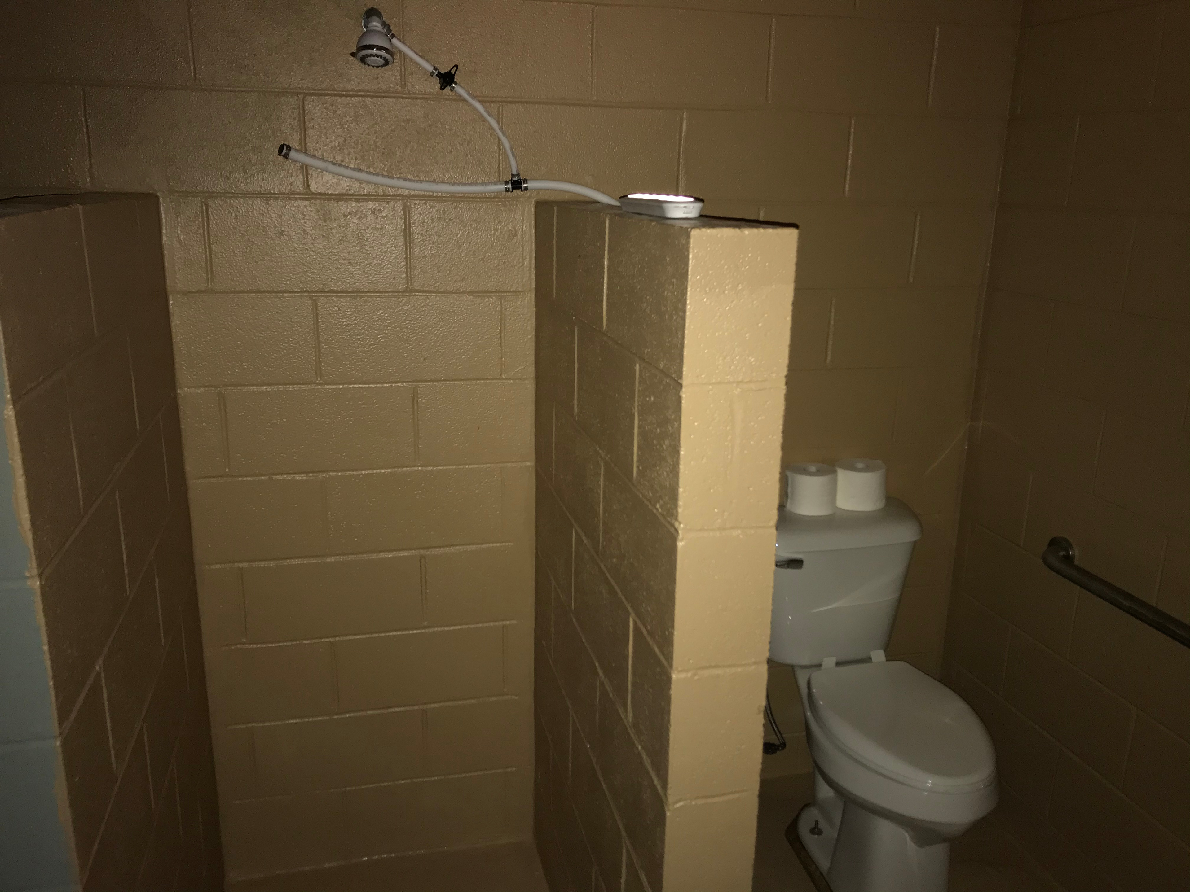 Bathhouse shower and toilet