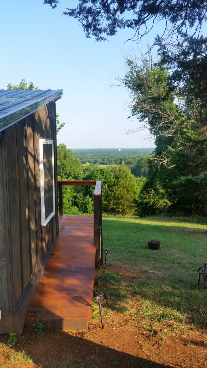 Looking Southeast from the entrance, fire pit straight ahead with view beyond