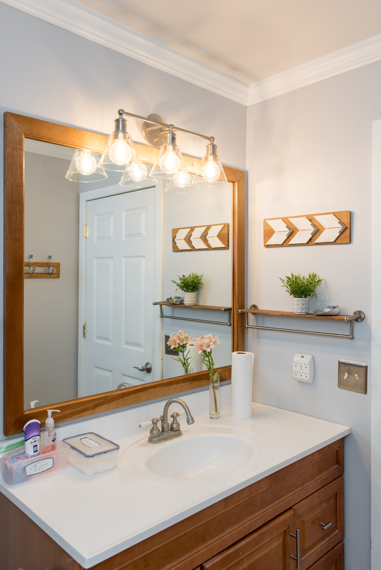 A bathroom can be accessed from the backdoor entrance