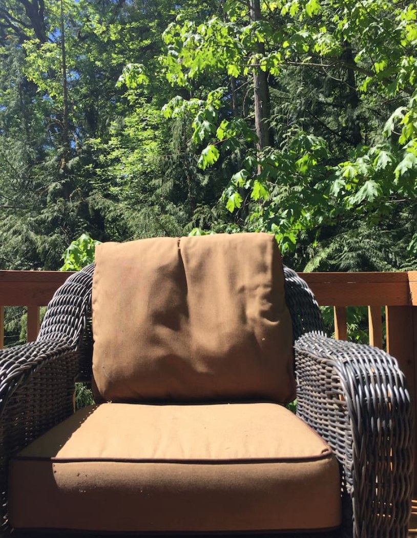 A comfy large chair out on the patio