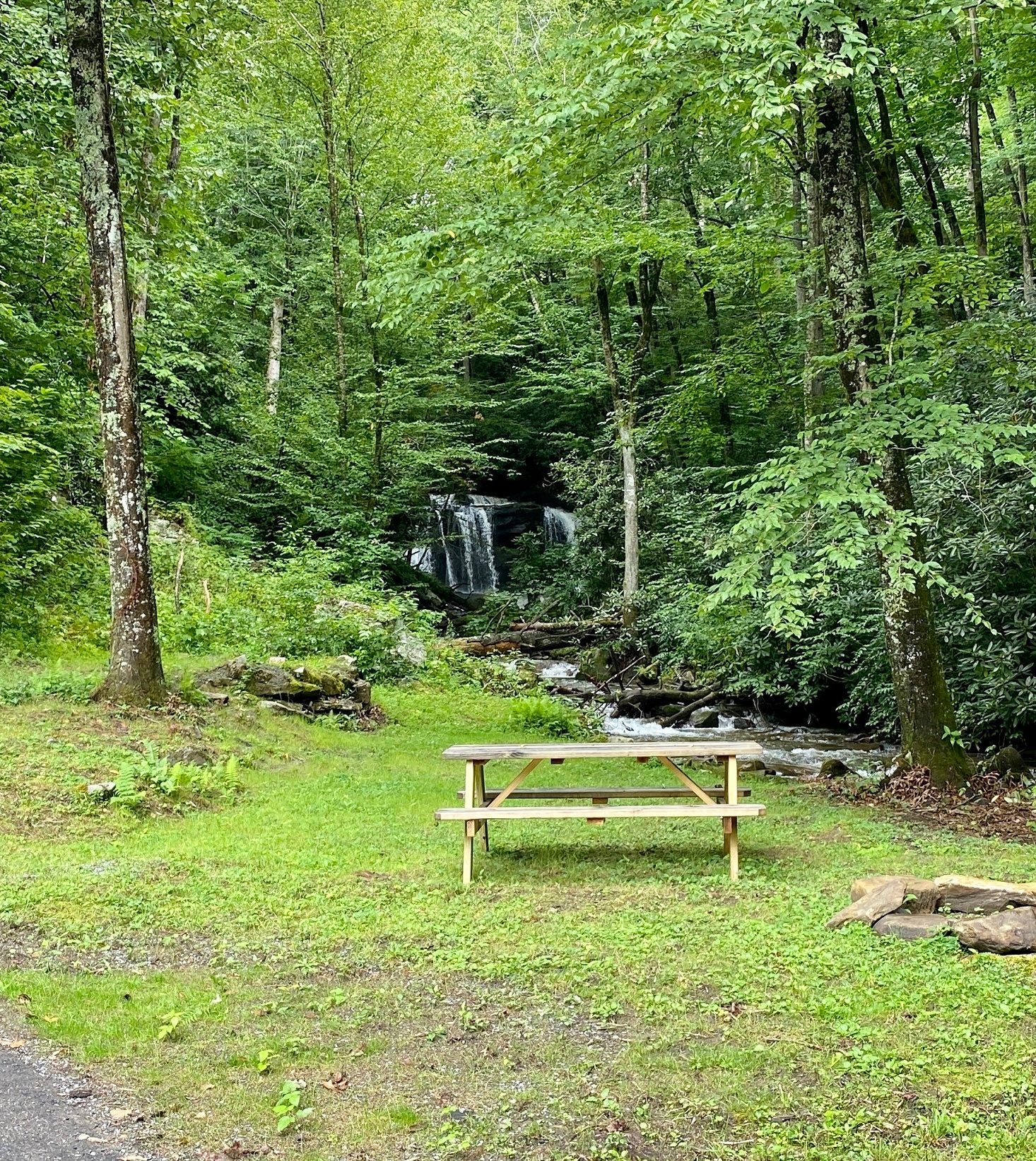Step out of your car and sit down right in front of a private waterfall! 