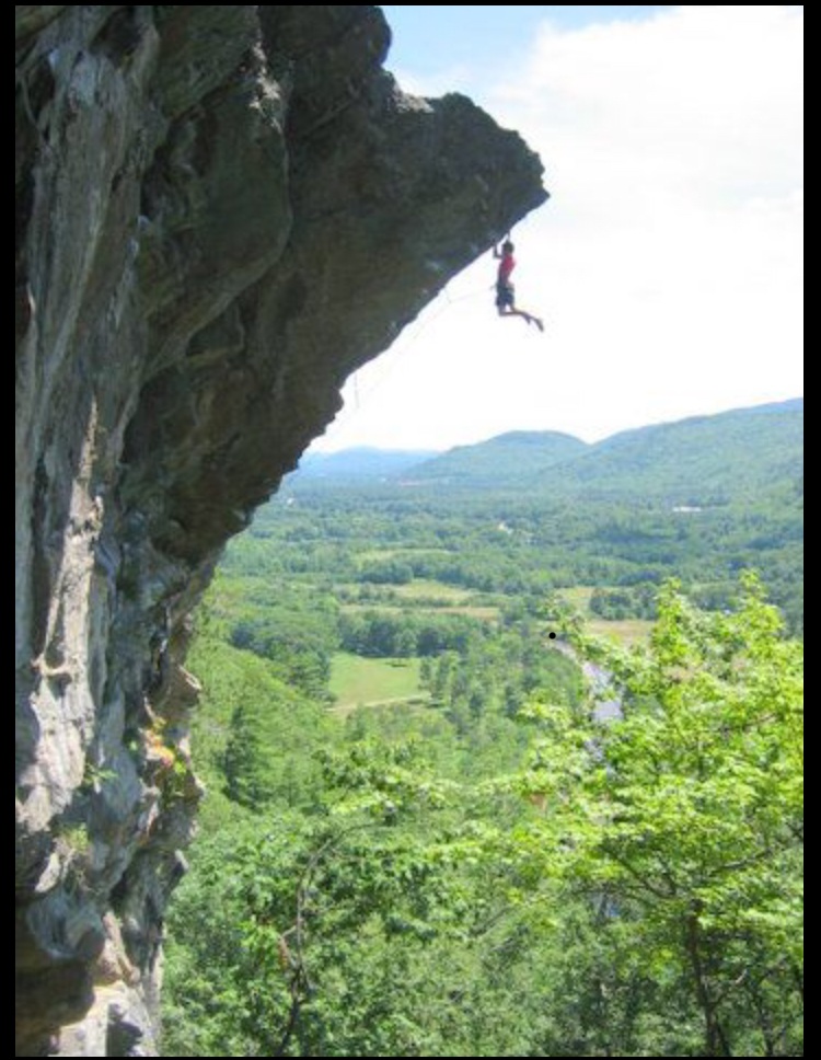 A bold Rumney sport climber 🧗‍♂️ on Predator (5.13a/b) at the Orange 🍊 Crush’s Wall