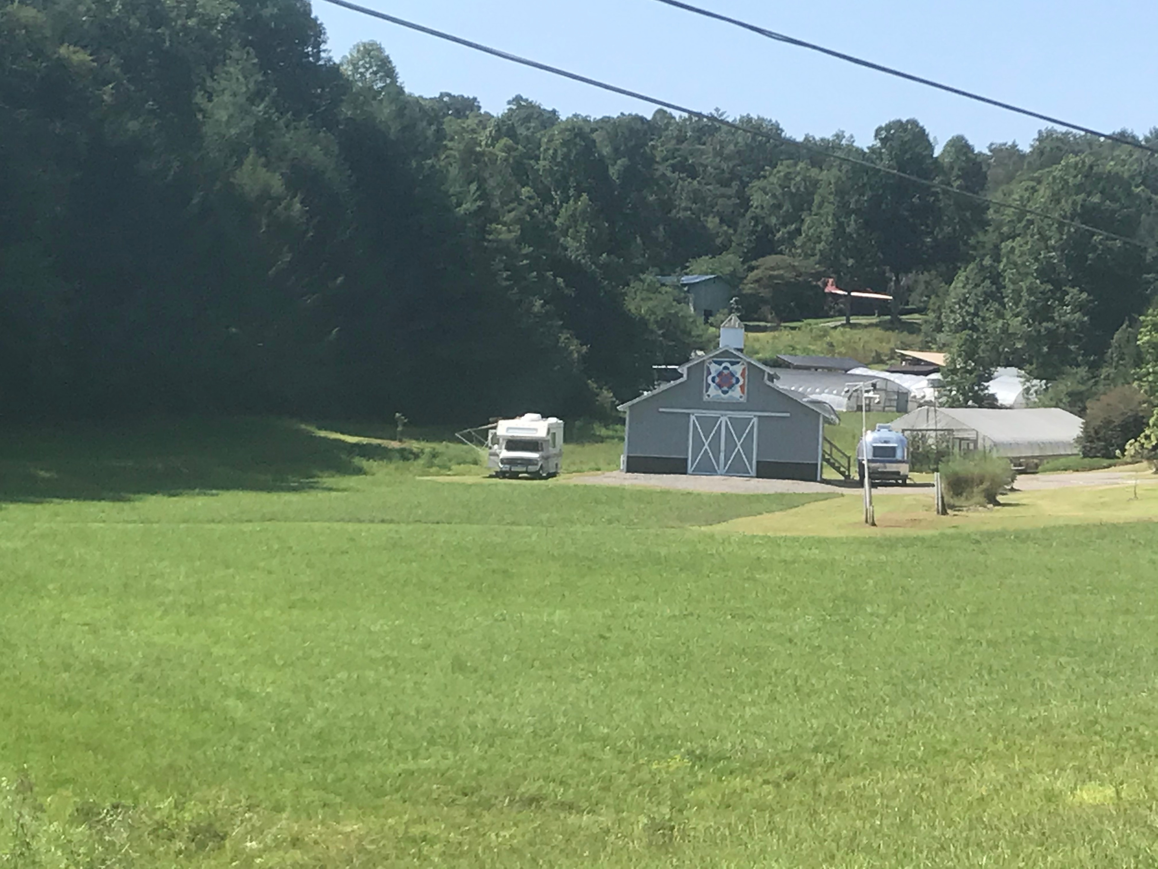 Site is on the left.  Our Airstream in on the right side of the barn.
