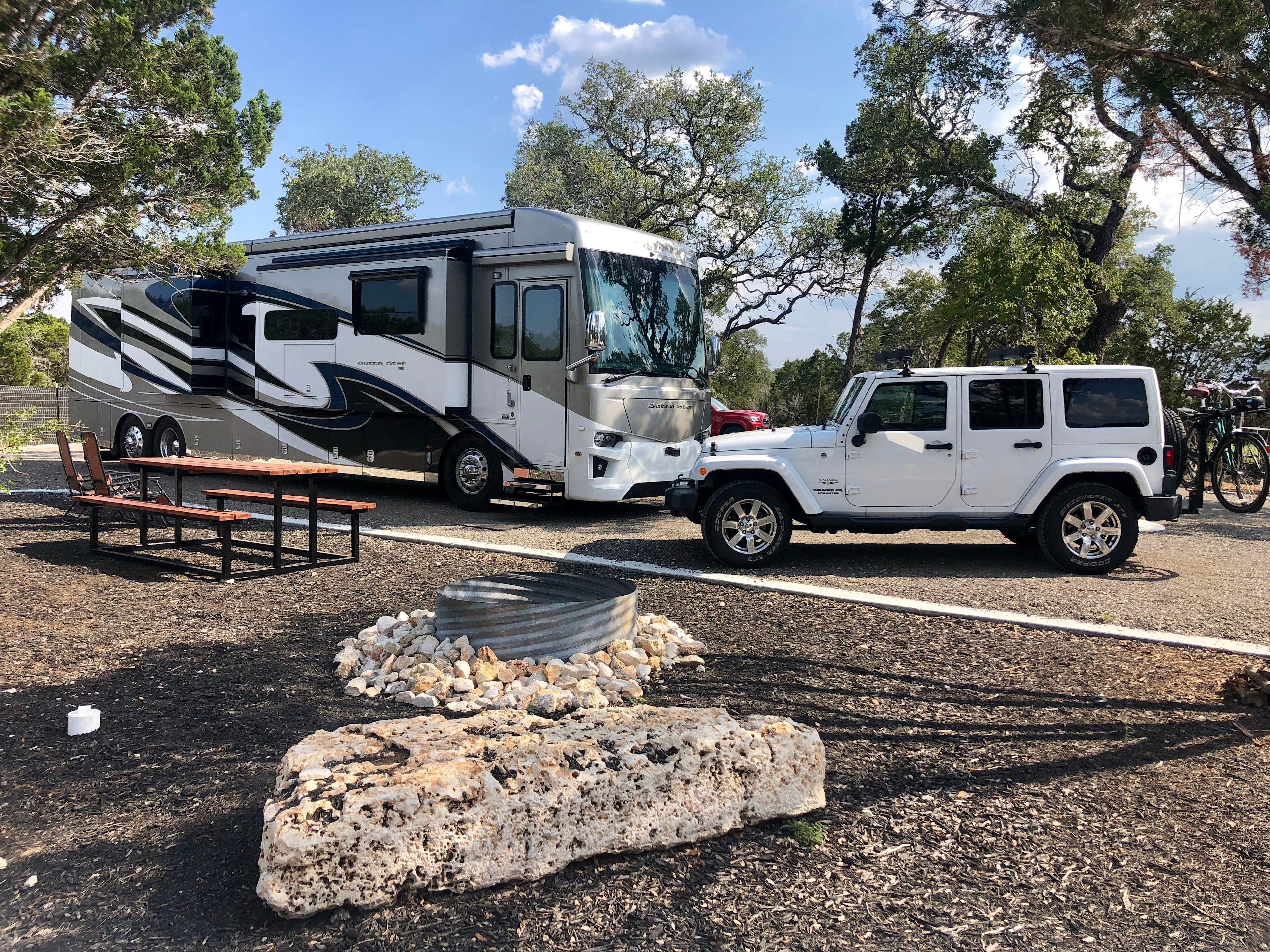 Premium RV Site 5 is Big Rig friendly! It has it's own natural area with fire pit and picnic table.