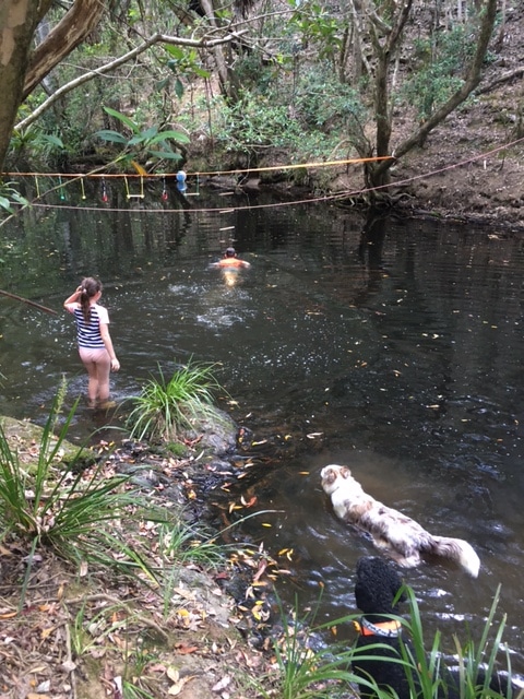 Easy river bank access to deep spot in the river, mind the rocks!  And a chair to have a wine while you watch the kids!  
