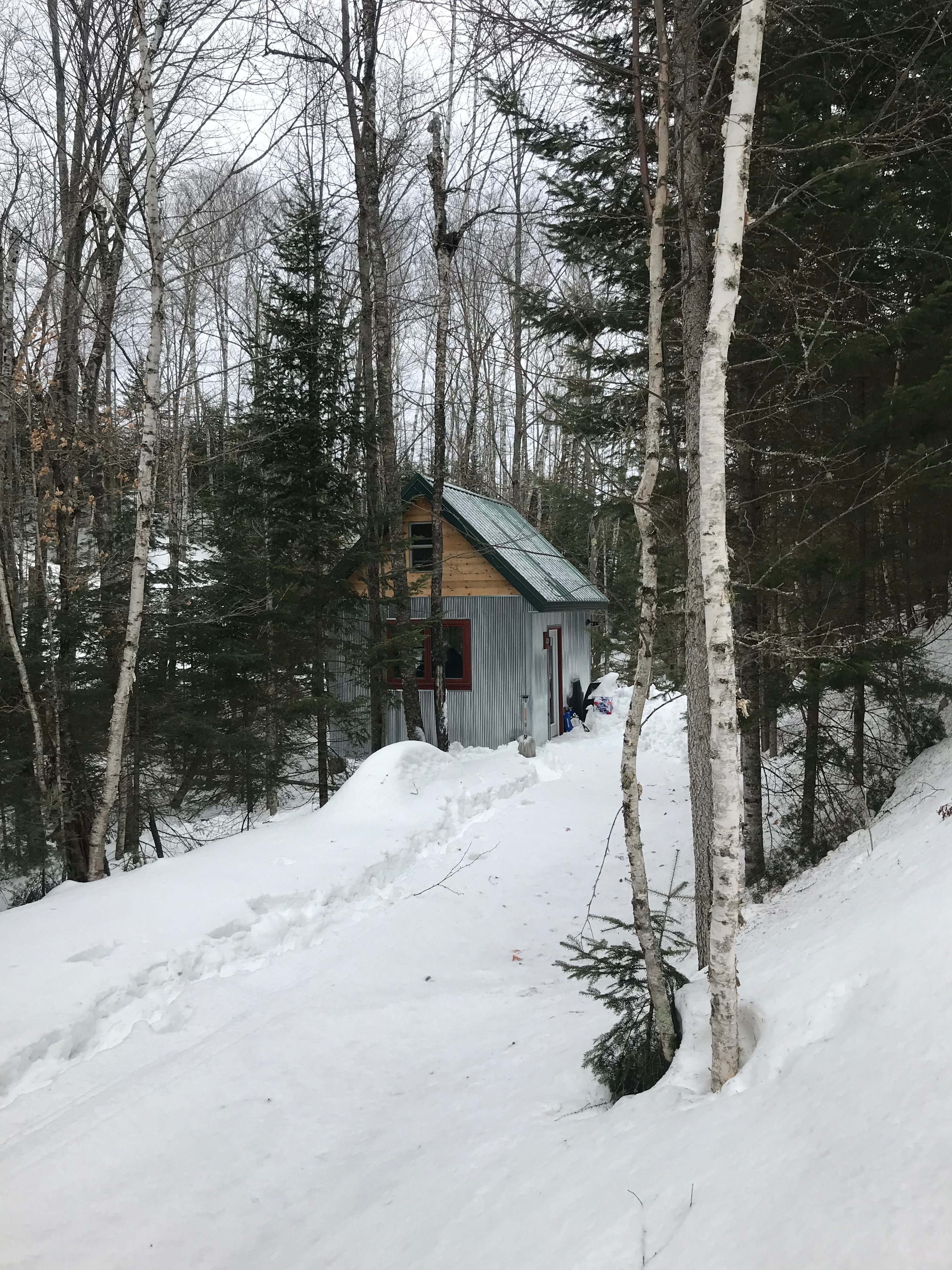Sometimes it snows ALOT.  Come prepared.  Too much to shovel!  A shovel and Otter sled will be left under the picnic table for easy transport of gear from the road.