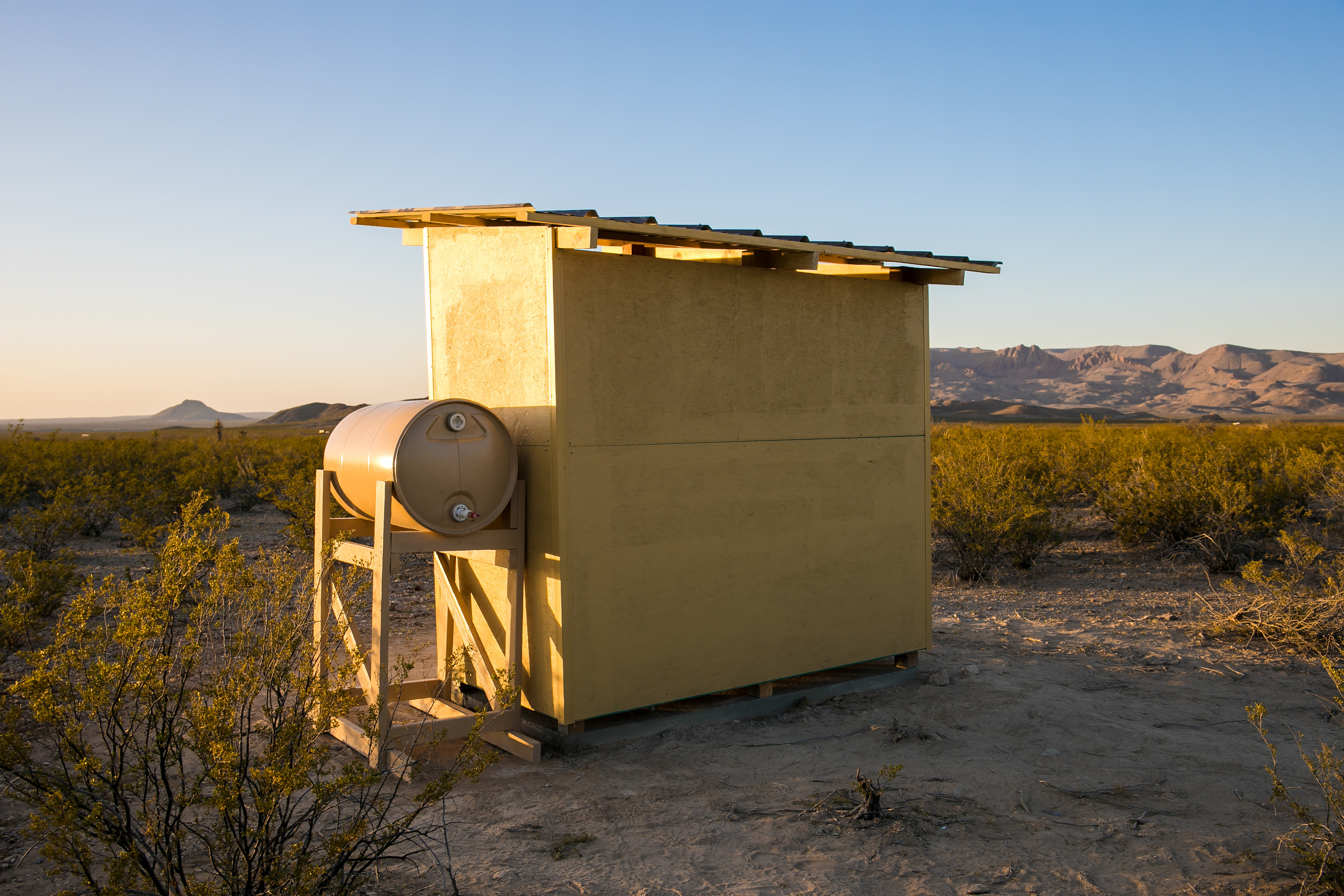 Bathroom (back) and 55 Gal Water Drum