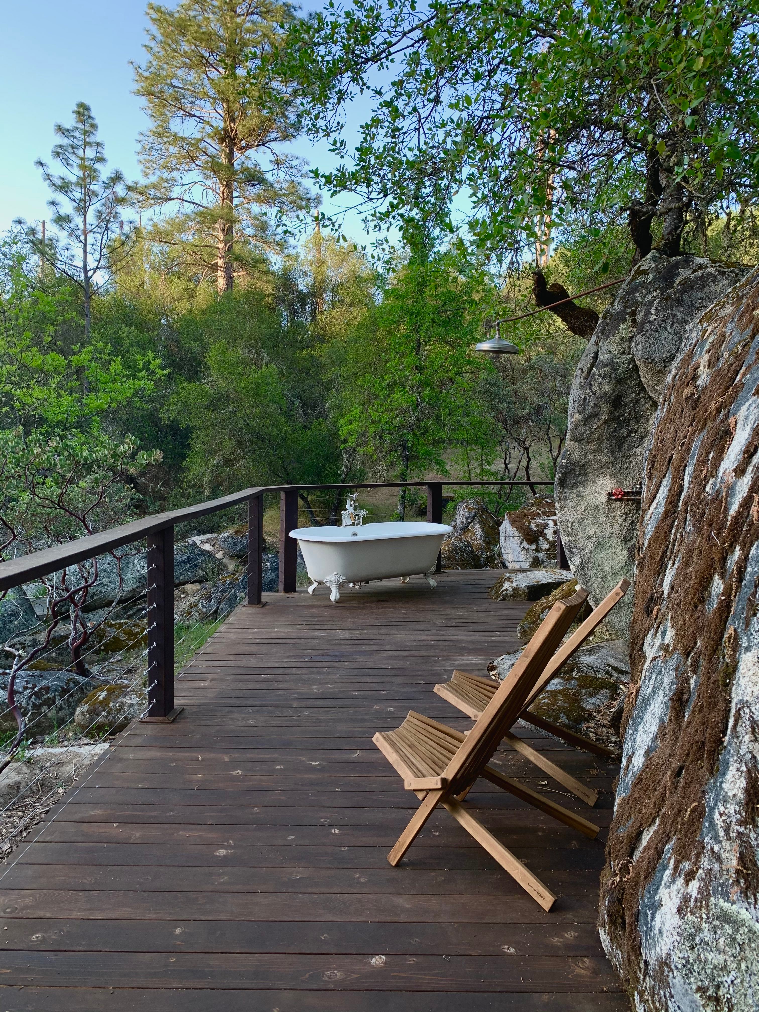 Outdoor tub and shower with running hot water!