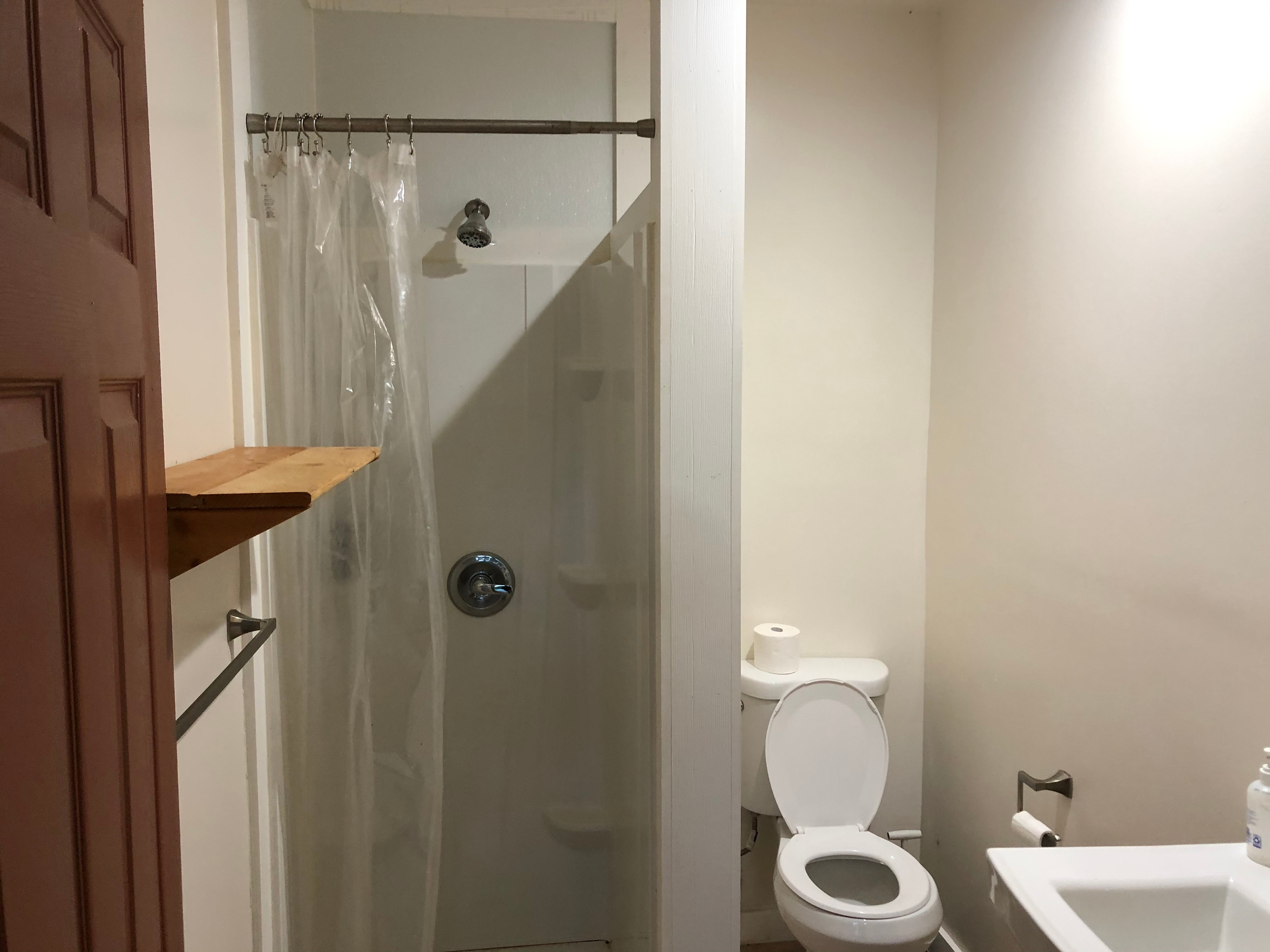 There are two bathrooms with showers