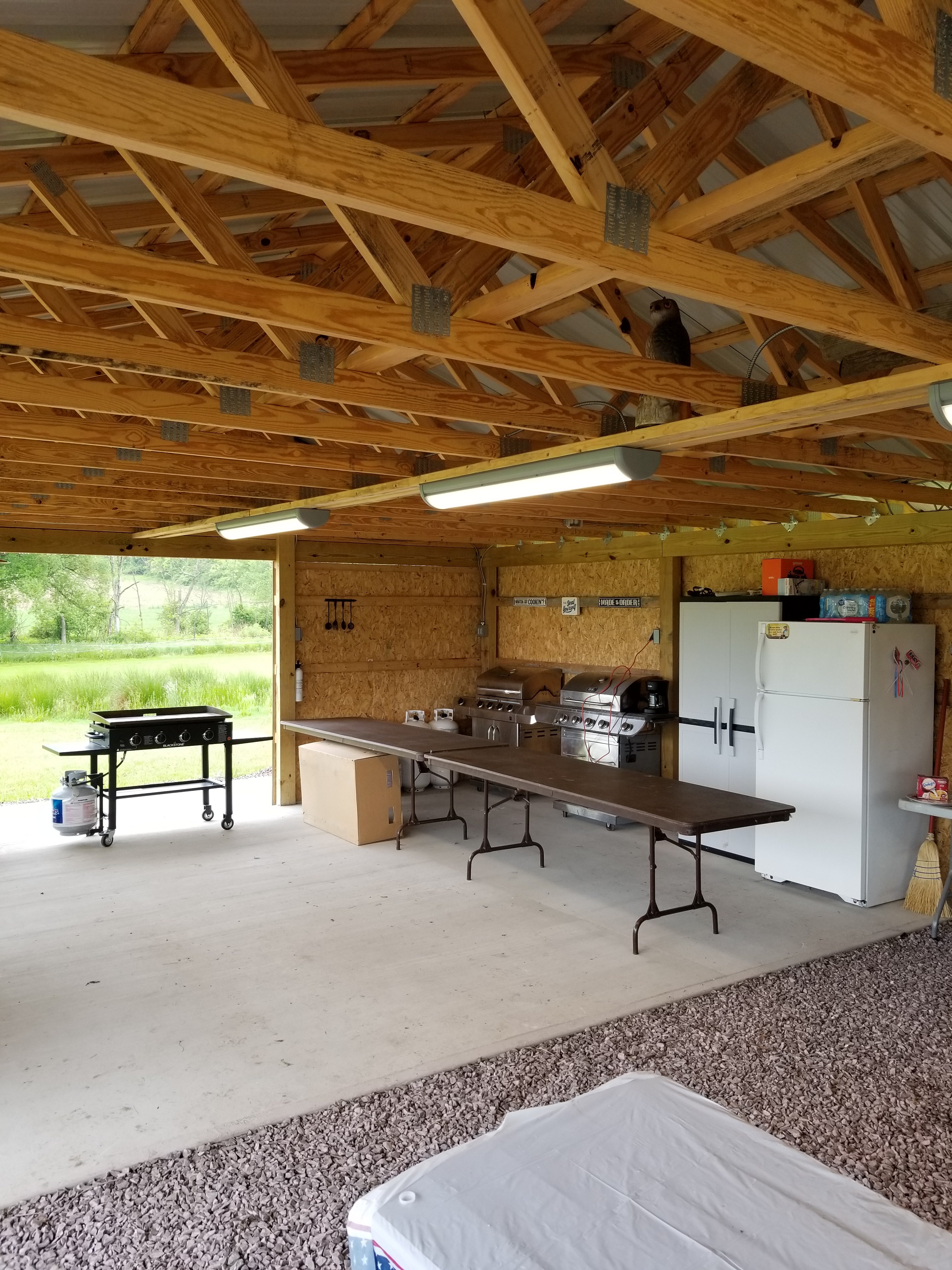 2 propane grills, flat top propane griddle, communal refrigerator