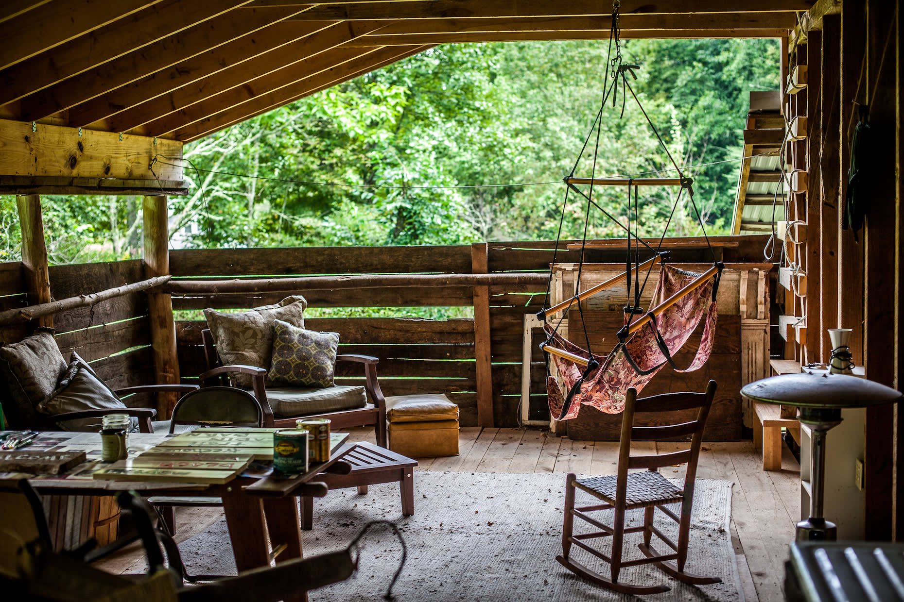 40' covered barn porch overlooking (and overhearing) the creek. Wonderful for cooking, eating, napping, playing and sleeping
