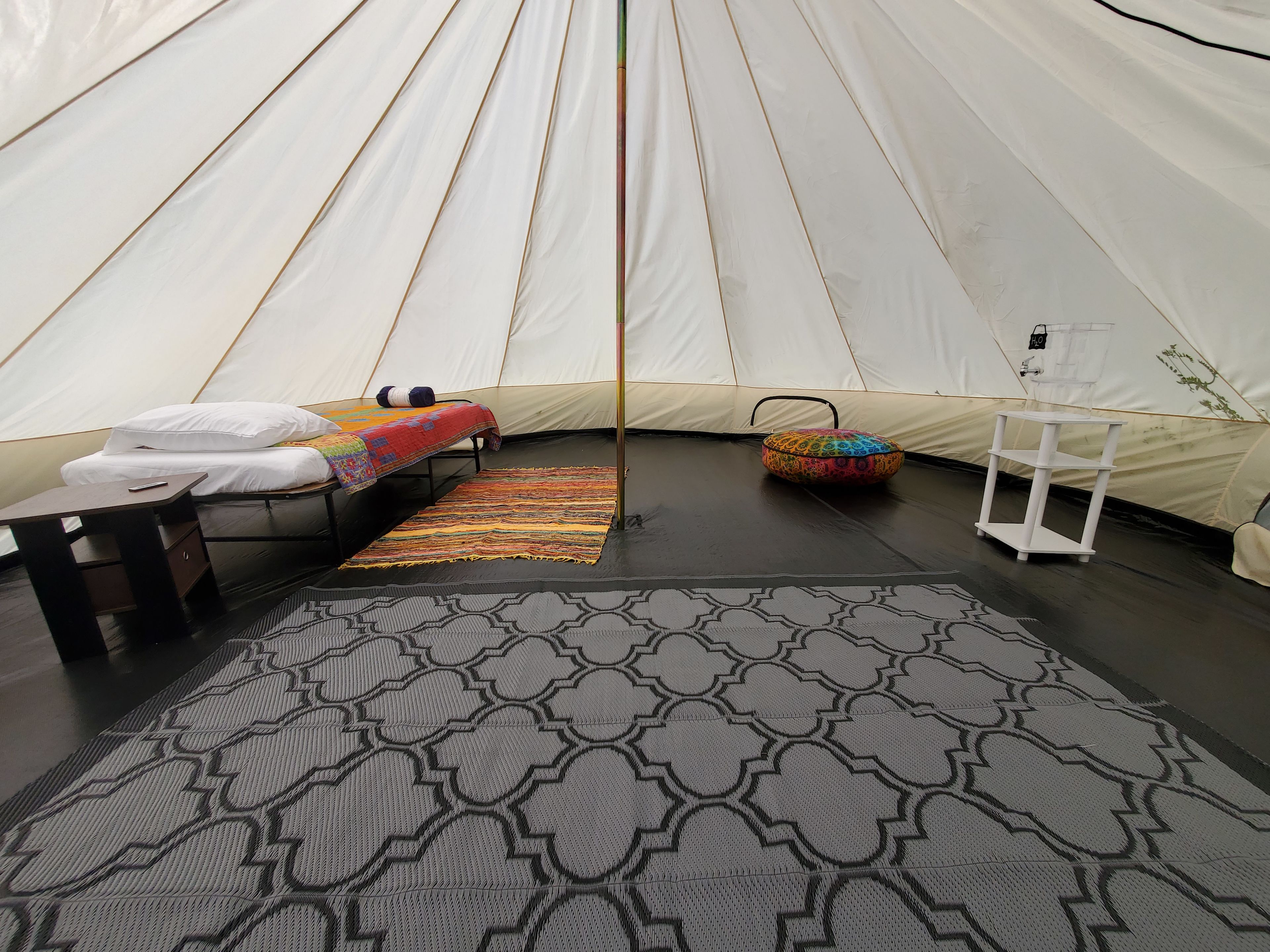 Site #2 is our smallest tent. At 16 feet it's perfect for 2-4 people. Located between sites 1 and 3 it's the perfect tent to book if you have a larger party and want everyone closer together. 