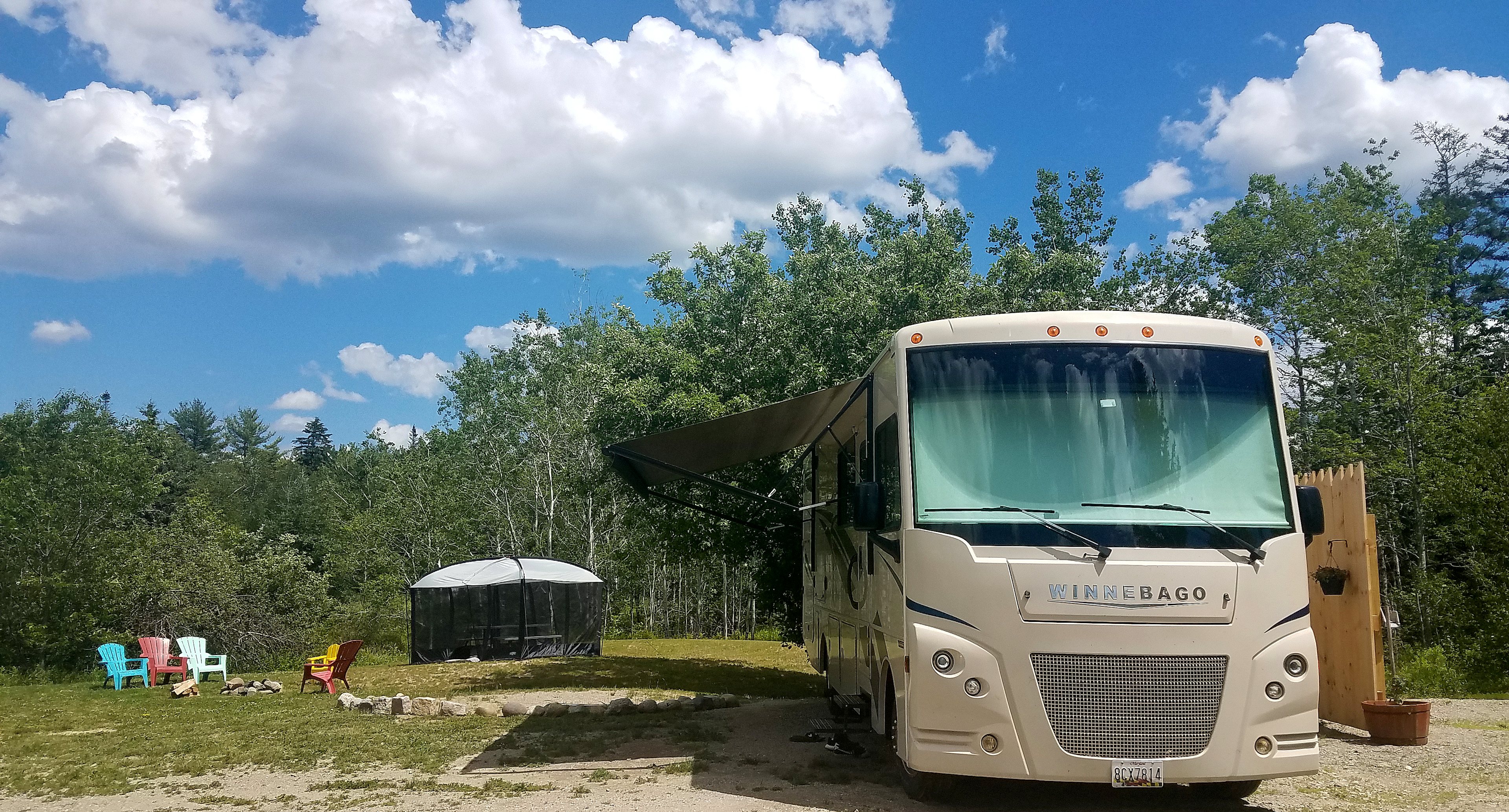 A 40 foot coach on the pad, feel free to bring and set up your own screen house!