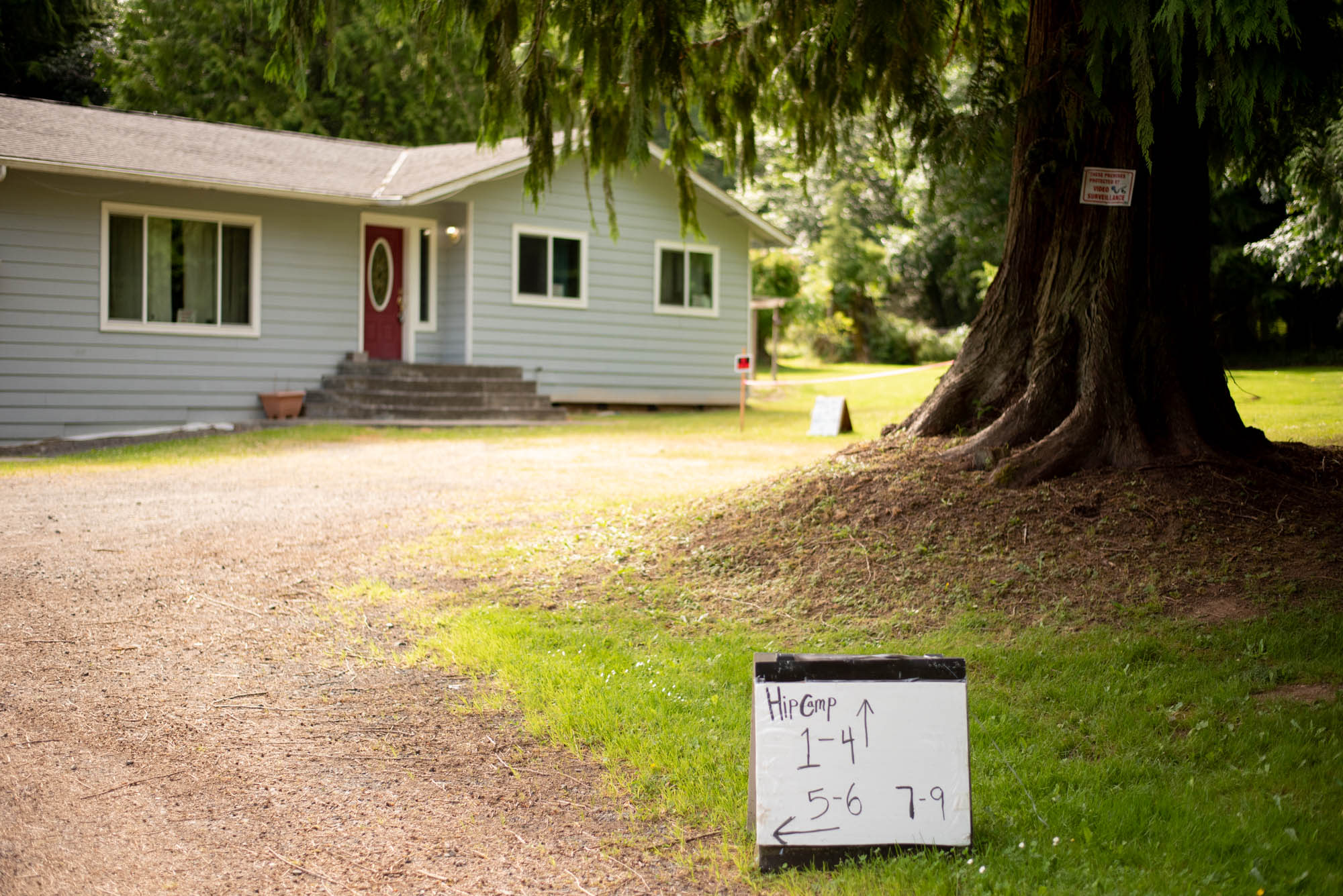 The entrance to the property and one of the signs helping campers know where to go. 