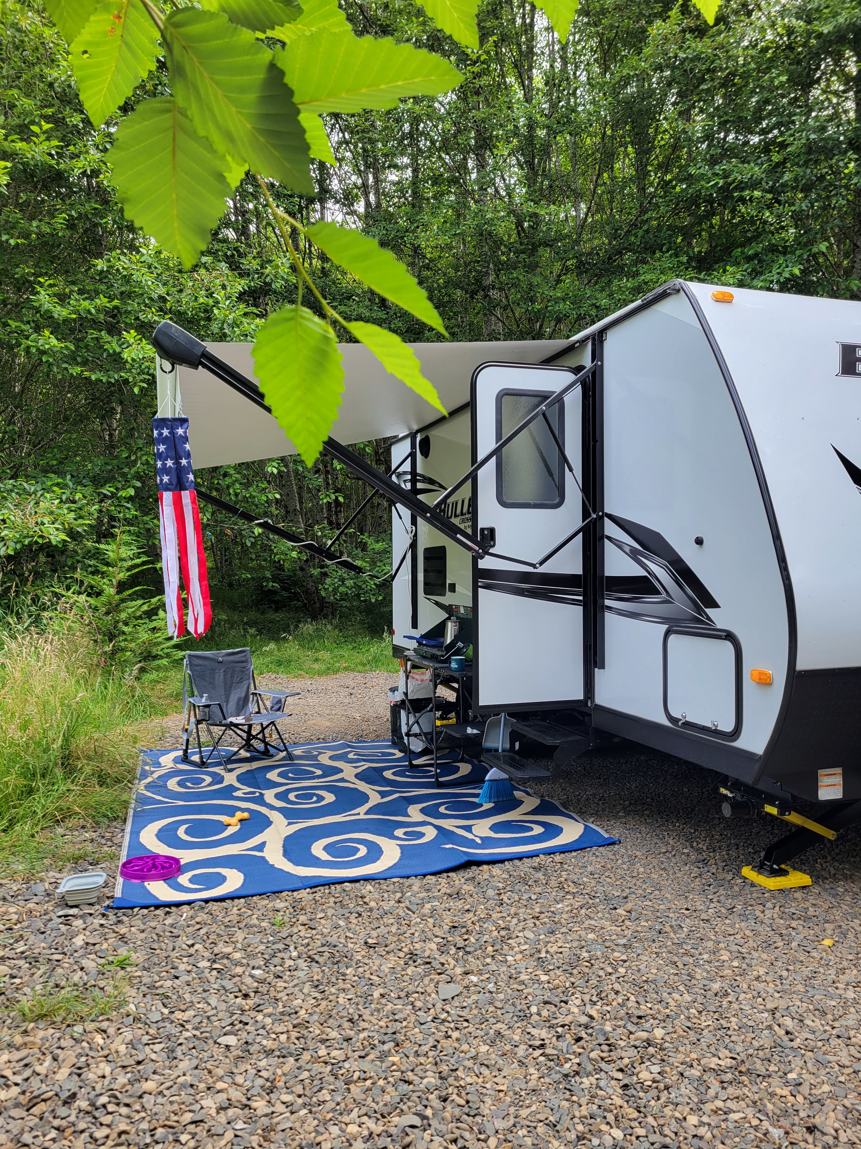 Same amount of room in back and on the other side where there picnic table and fire pit are. 