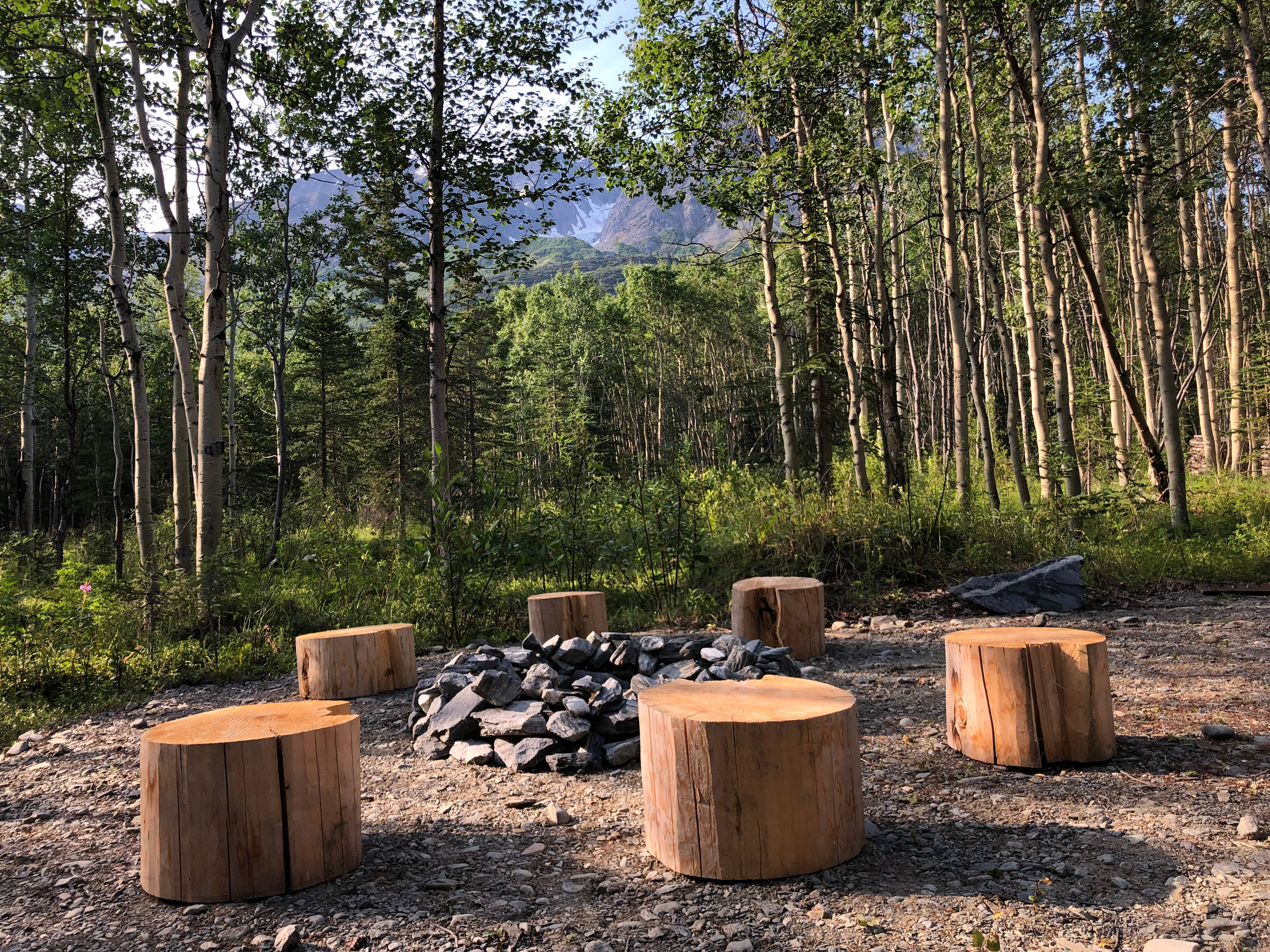 Fires are not allowed any time at this campsite during dry day/night time conditions. (Even outside of regional "Fire Ban" periods... no exceptions.)  Please call to verify if and when fires are permitted. If a fire is to be enjoyed during a period where the ground and vegetation is damp/wet, a provided and filled water pale must be present next to the fire ring. The fire must be completely doused with water and the embers completely expired of heat after use. There are no local wildfirefire services in the region. Thanks for your understanding!