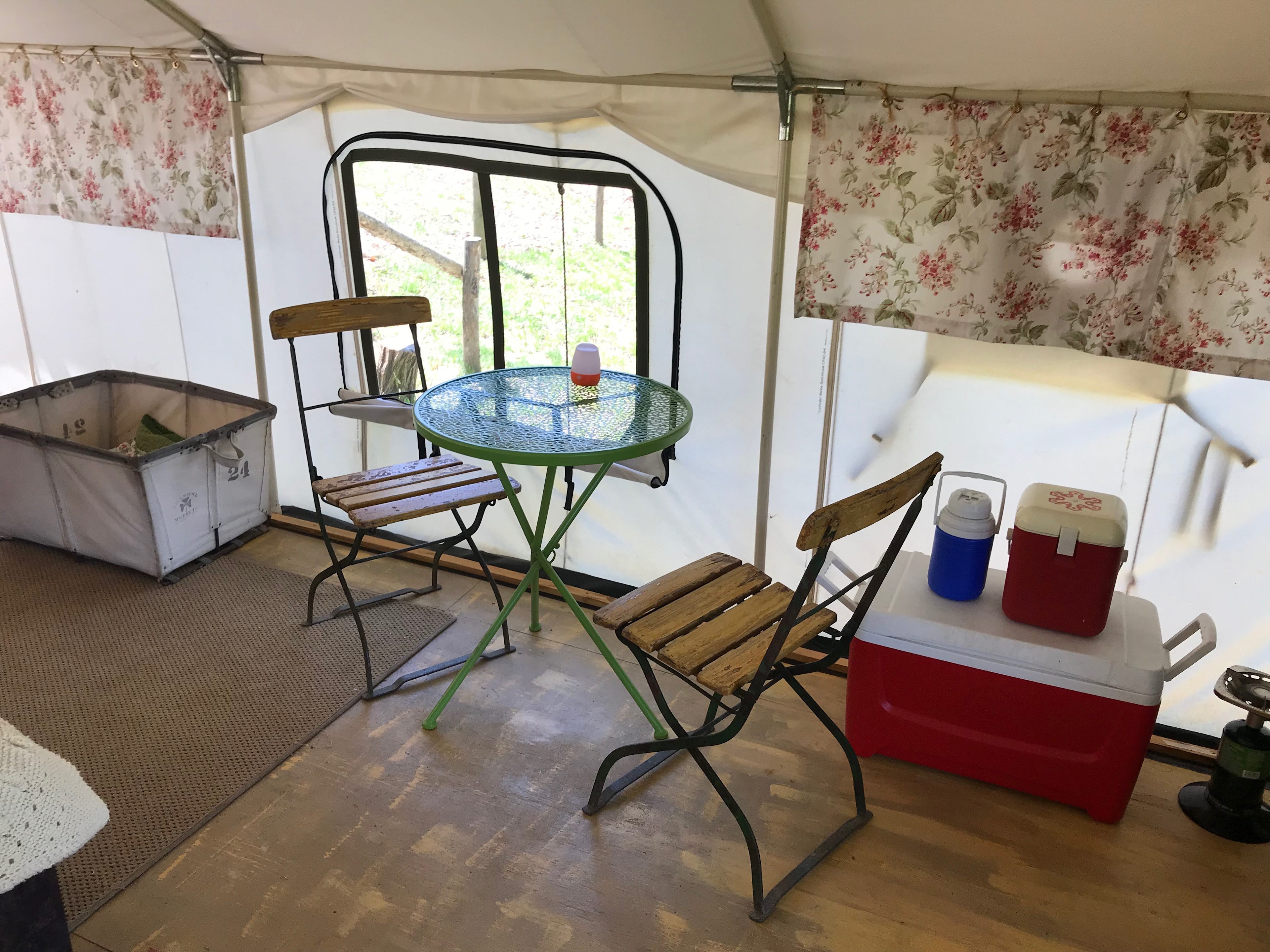 Have a charming breakfast inside the Lee Glamping Tent. Inside the tent we provide a cooler with a block of ice to keep your groceries cool. 