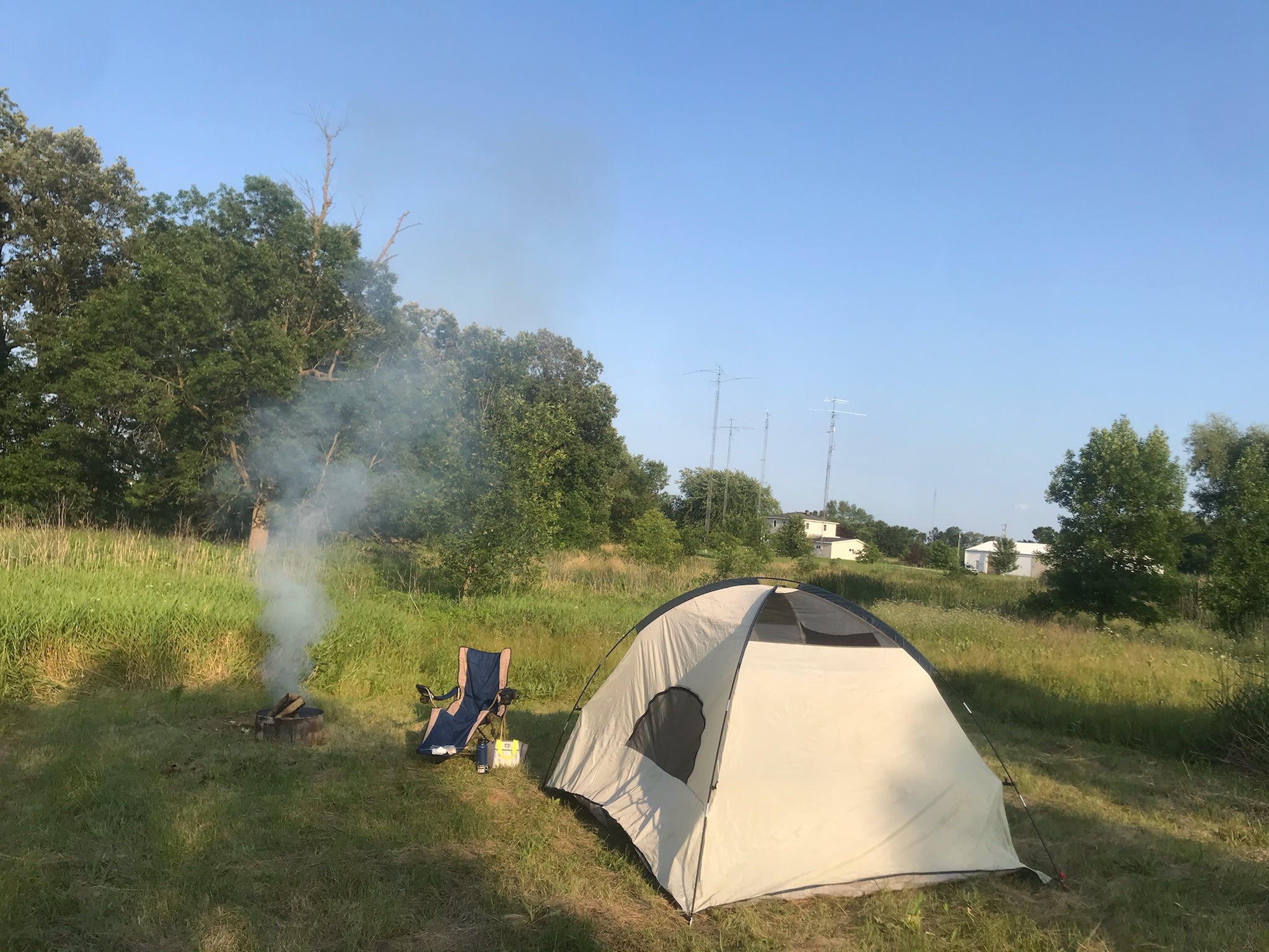 One of our guests all ready for a peaceful evening. Tent and other items NOT included. Our home is in the background.