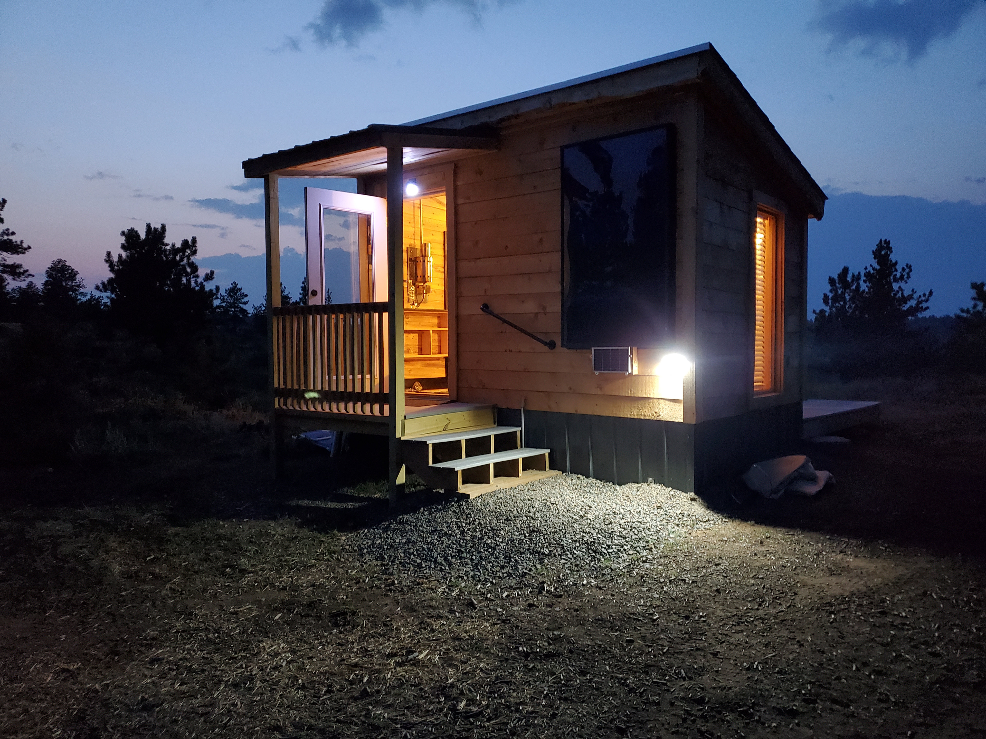 The view of the front door of the cabin.